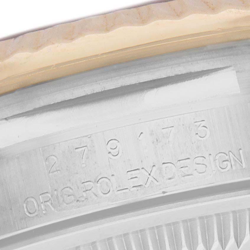 The image shows a close-up of the side of a Rolex Datejust 279173 Women's Steel and Gold (two tone) Green Dial 279173 Women's Steel and Gold (two tone) Green Dial, highlighting the model number and "ORIG ROLEX DESIGN" engraving.