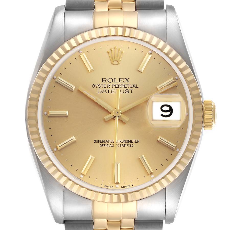 The Rolex Datejust watch is photographed head-on, showing the dial, fluted bezel, date window, and part of the bracelet.