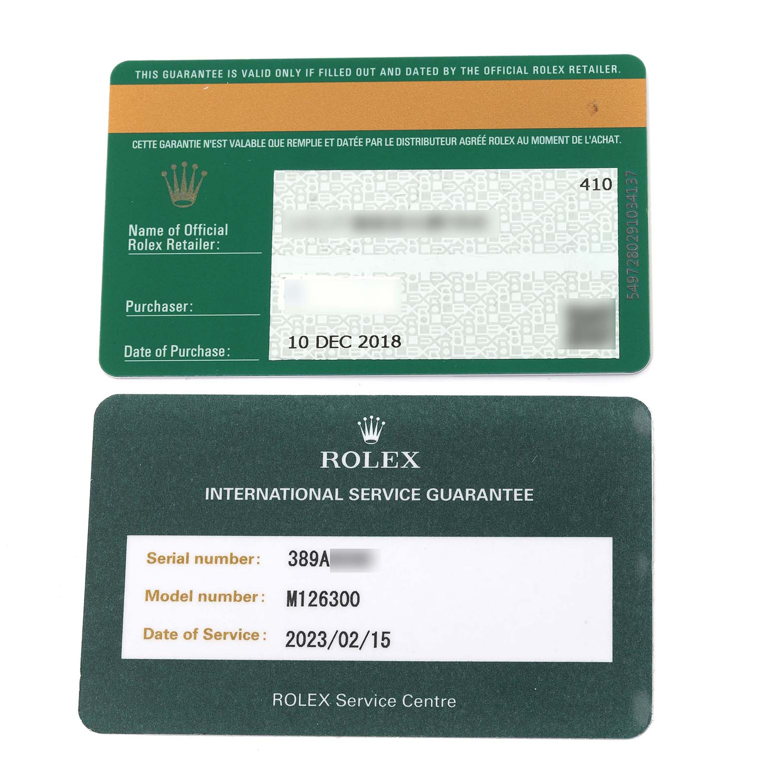 The image shows two guarantee cards for the Rolex Datejust 41 126300 Men
s Stainless Steel Grey Dial 126300 Men
s Stainless Steel Grey Dial, including a purchase card and an international service guarantee card.