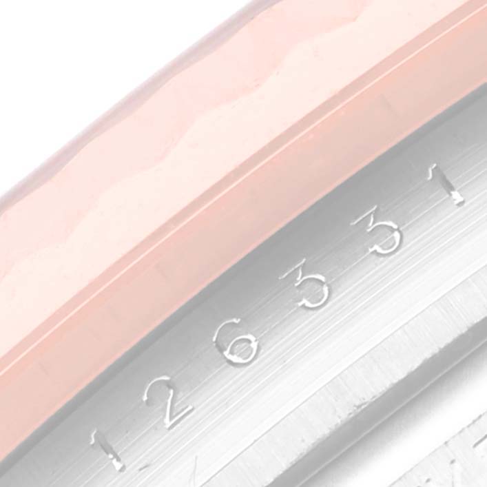 The image shows a close-up of the serial number engraving on the case side of a Rolex Datejust 41 126331 Men
s Steel and Gold (two tone) Brown Dial 126331 Men
s Steel and Gold (two tone) Brown Dial watch.