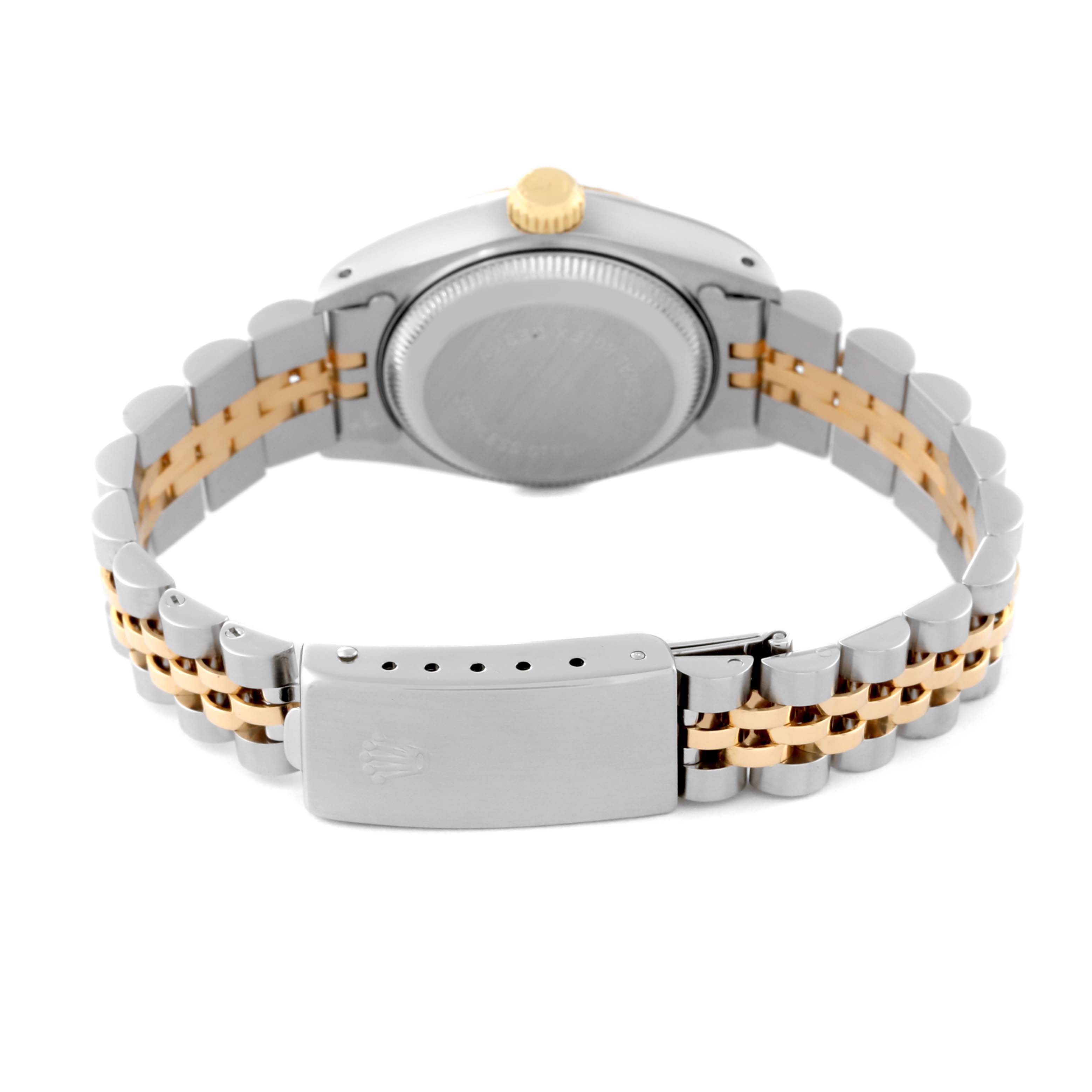 The image shows the back of a Rolex Datejust 69173 Women
s Steel and Gold (two tone) Champagne Dial 69173 Women
s Steel and Gold (two tone) Champagne Dial watch, highlighting its case, bracelet, and clasp.