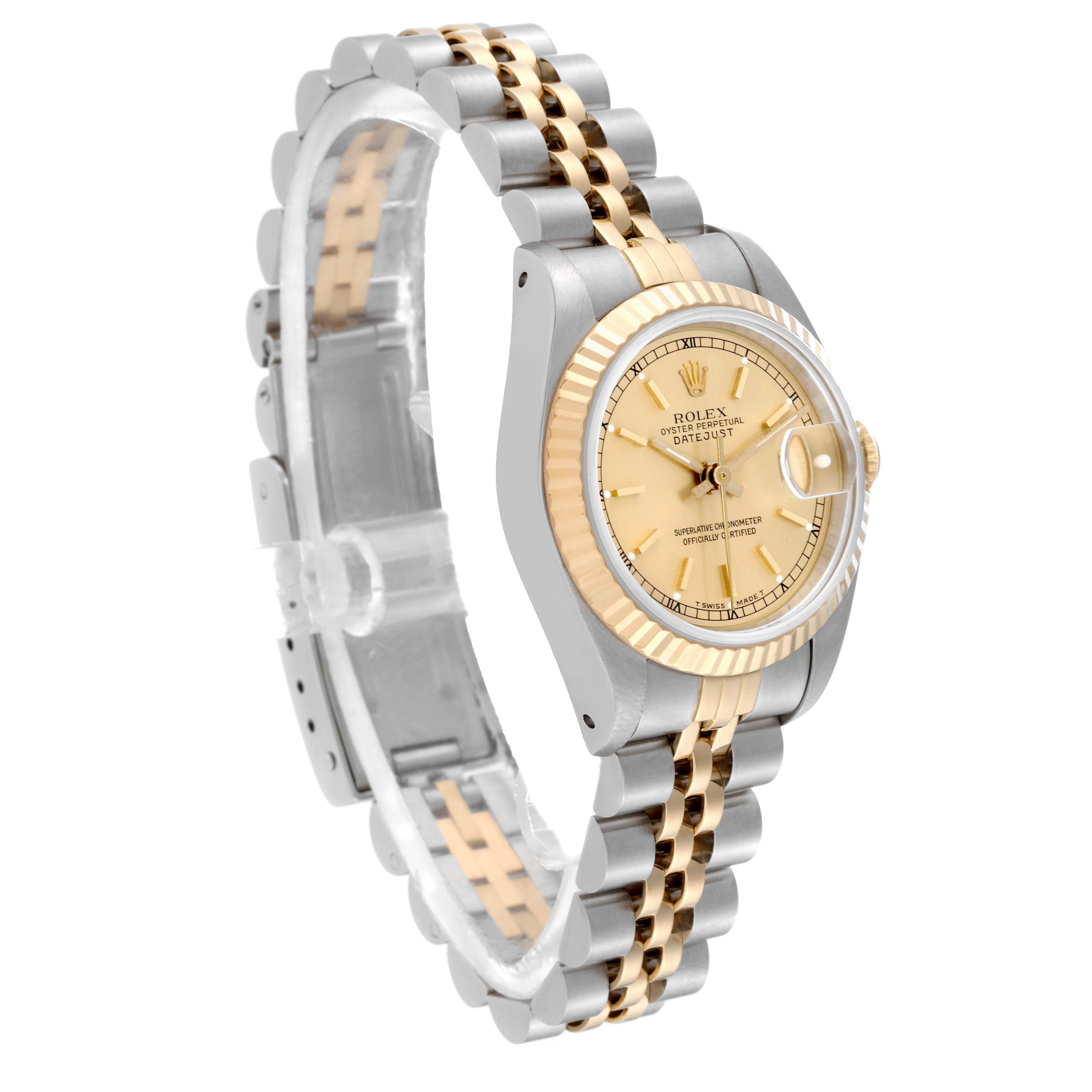 The image shows a Rolex Datejust 69173 Women
s Steel and Gold (two tone) Champagne Dial 69173 Women
s Steel and Gold (two tone) Champagne Dial watch at a three-quarter angle, highlighting the face, bezel, and two-tone bracelet.