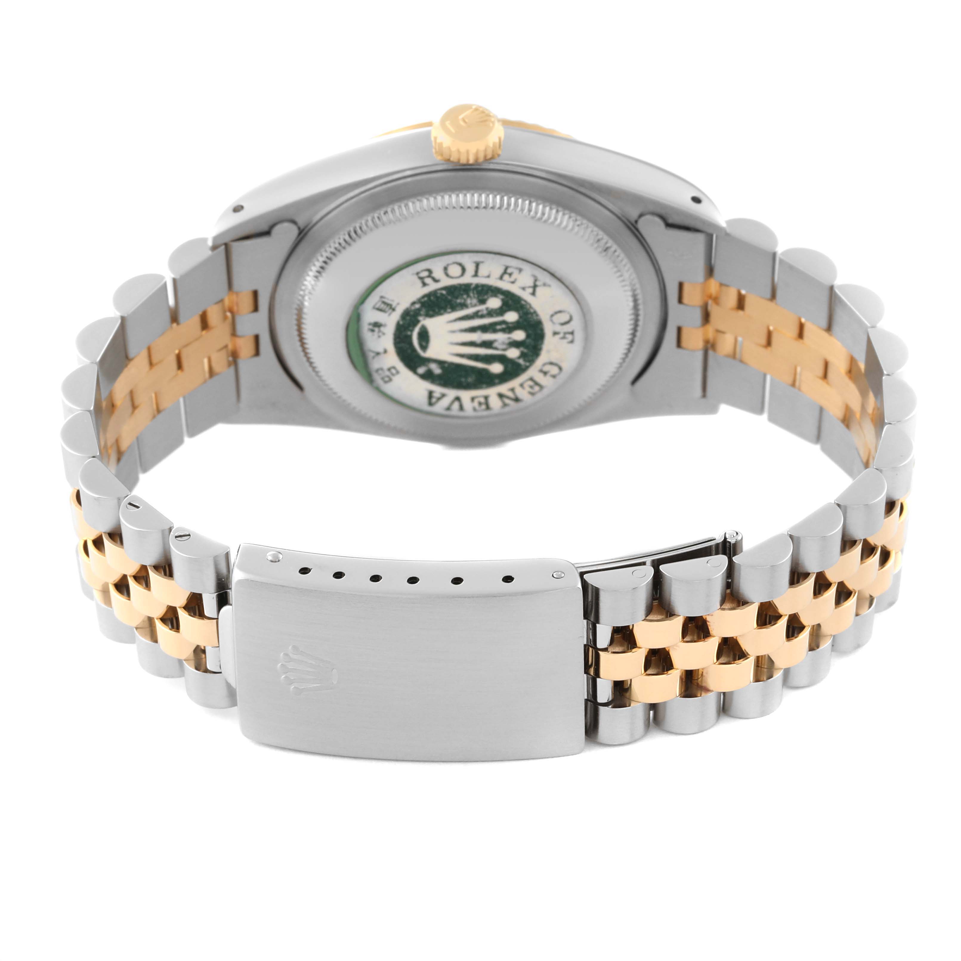 This image shows the back and bracelet of a Rolex Datejust 16233 Men's Steel and Gold (two tone) Champagne Dial 16233 Men's Steel and Gold (two tone) Champagne Dial watch, highlighting the caseback, crown, and two-tone jubilee bracelet with a clasp.