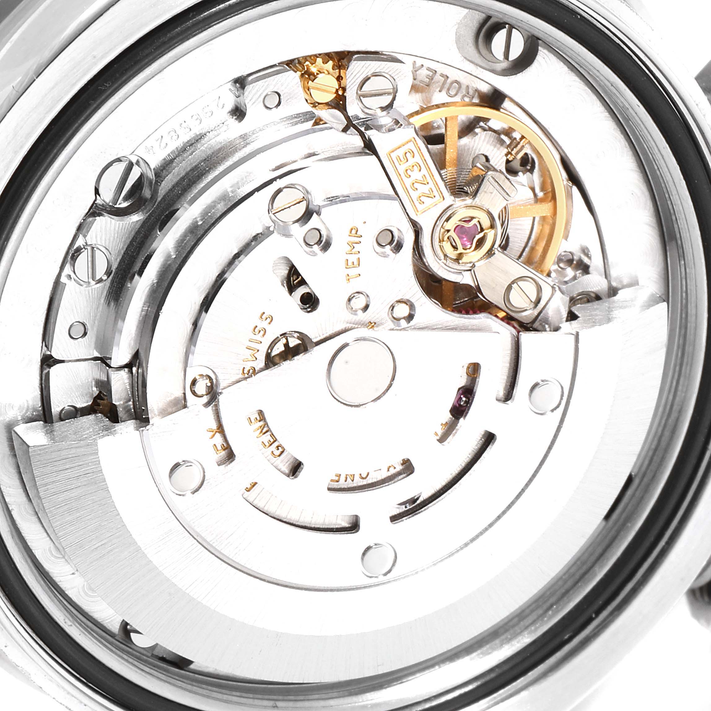 This image shows a close-up of the internal mechanical movement of a Mid-Size Rolex watch.