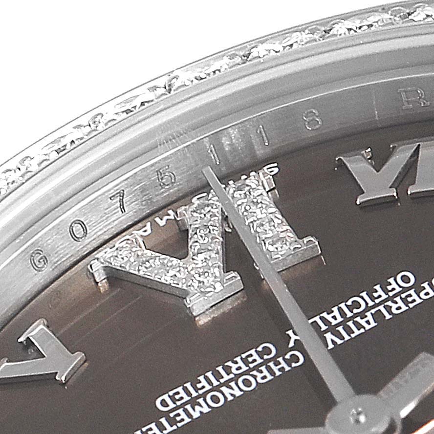 This image shows the detailed view of the dial and bezel of a Mid-Size Rolex watch.