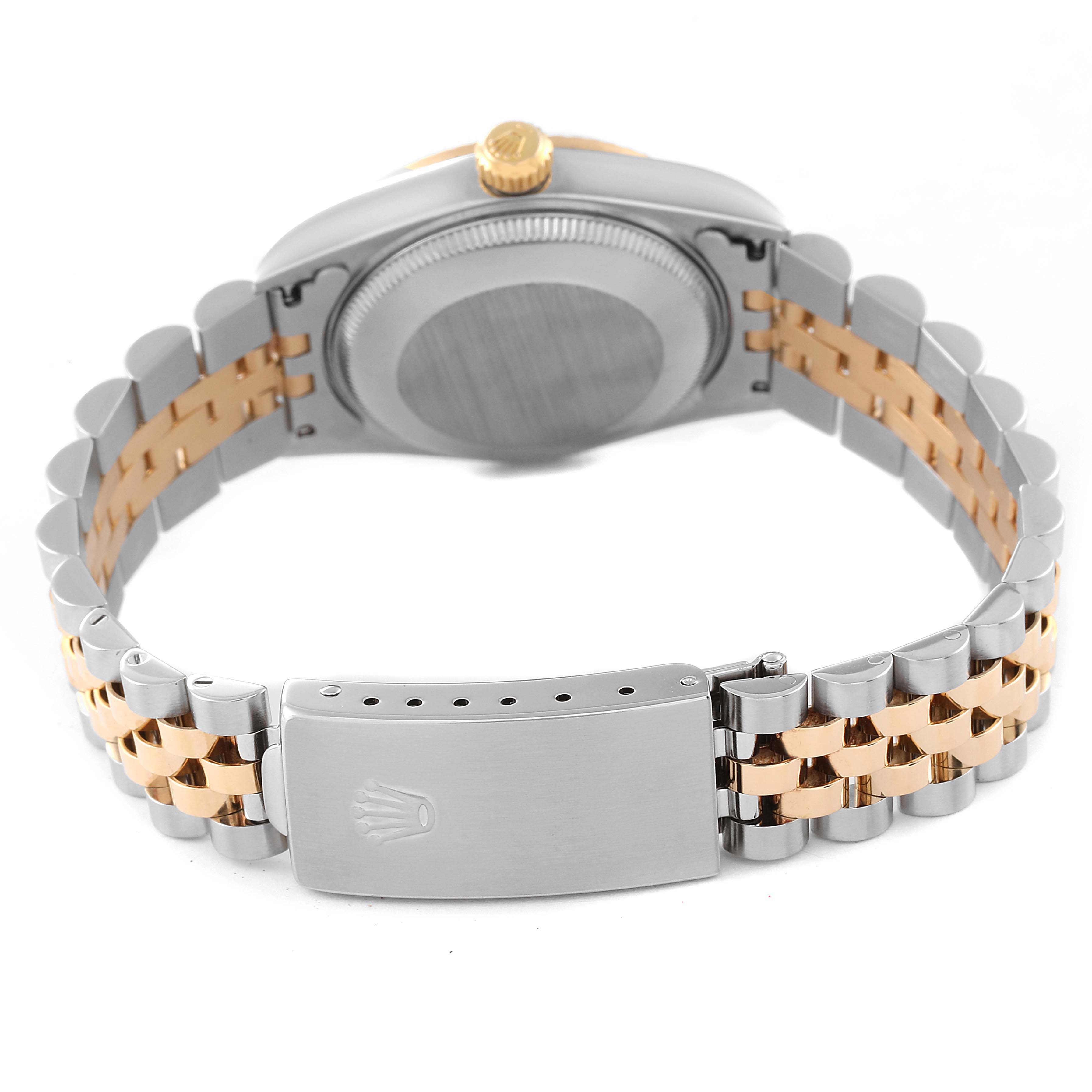 This image shows the back view of the Rolex Mid-Size 78273 Women
s Steel and Gold (two tone) Champagne Dial 78273 Women
s Steel and Gold (two tone) Champagne Dial model watch, highlighting the case back, crown, and two-toned bracelet with the clasp.