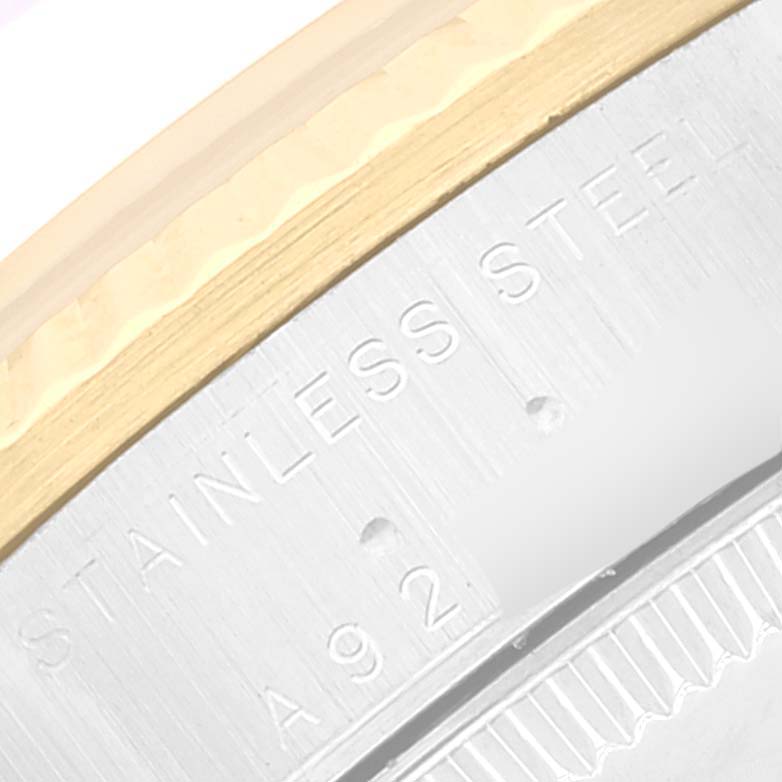 This image shows a close-up of the stainless steel case back with the engraved writing on a Rolex Mid-Size 78273 Women
s Steel and Gold (two tone) Champagne Dial 78273 Women
s Steel and Gold (two tone) Champagne Dial model watch.