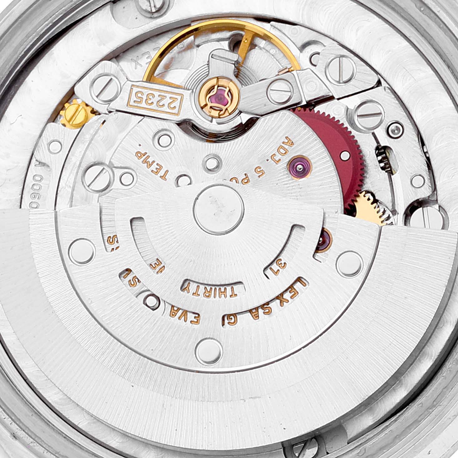 The image shows a close-up view of the movement mechanism of a mid-size Rolex watch model.