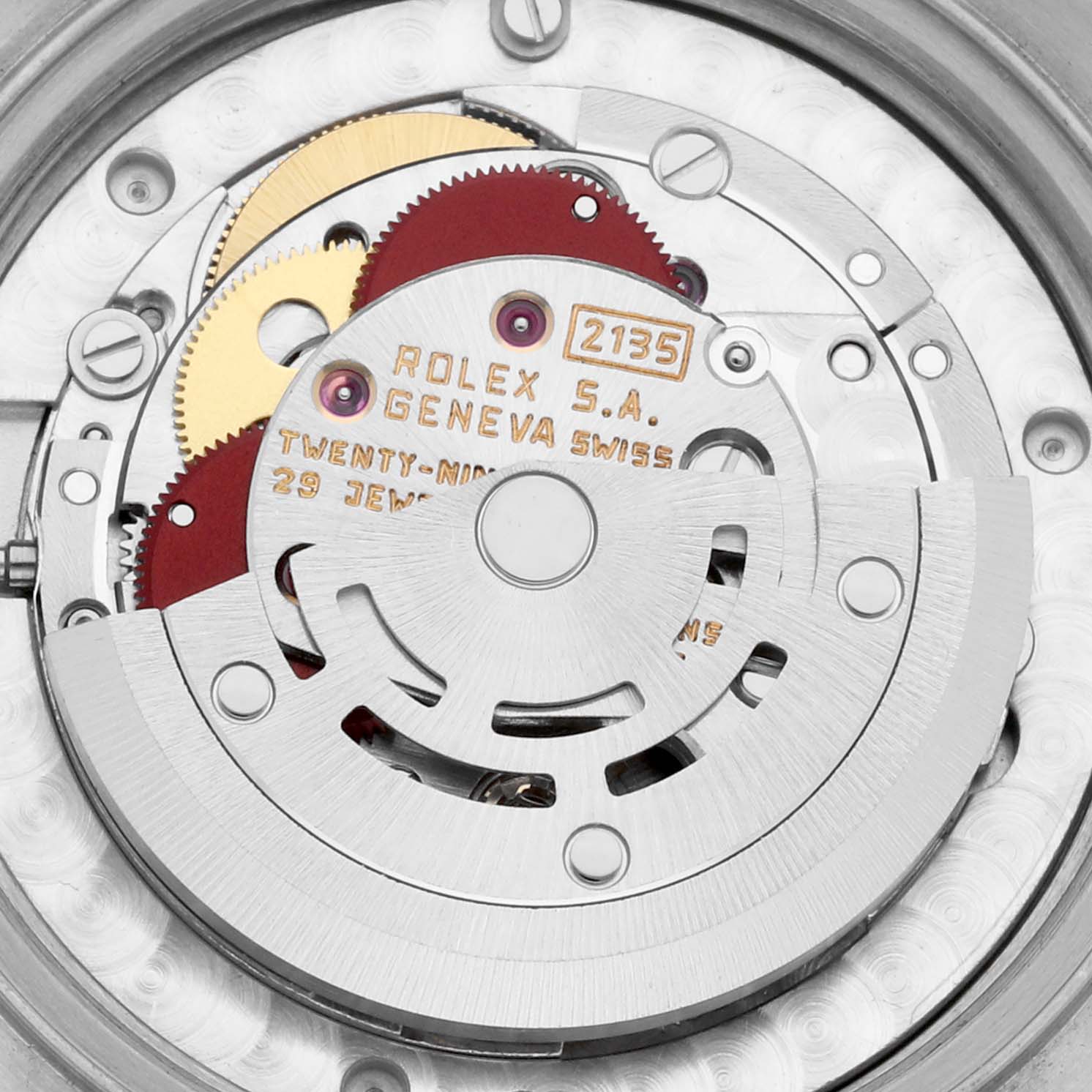 This image shows a close-up view of the movement mechanism inside a Rolex Mid-Size 68273 Women's Steel and Gold (two tone) Champagne Dial 68273 Women's Steel and Gold (two tone) Champagne Dial watch, model 2135.