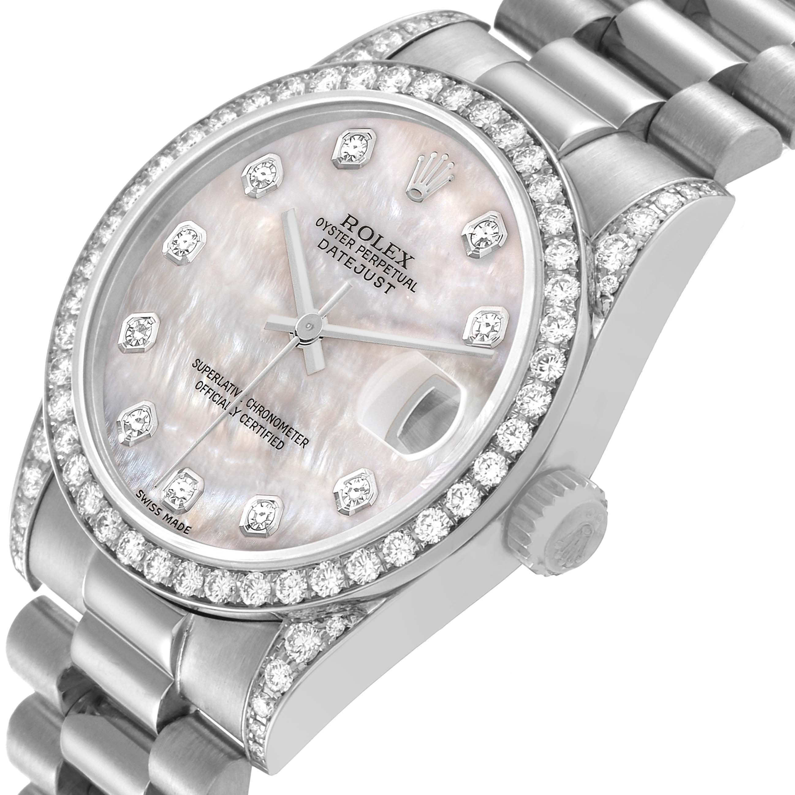 The Rolex Mid-Size model is shown at an oblique angle highlighting its diamond-studded bezel, crown, and bracelet.