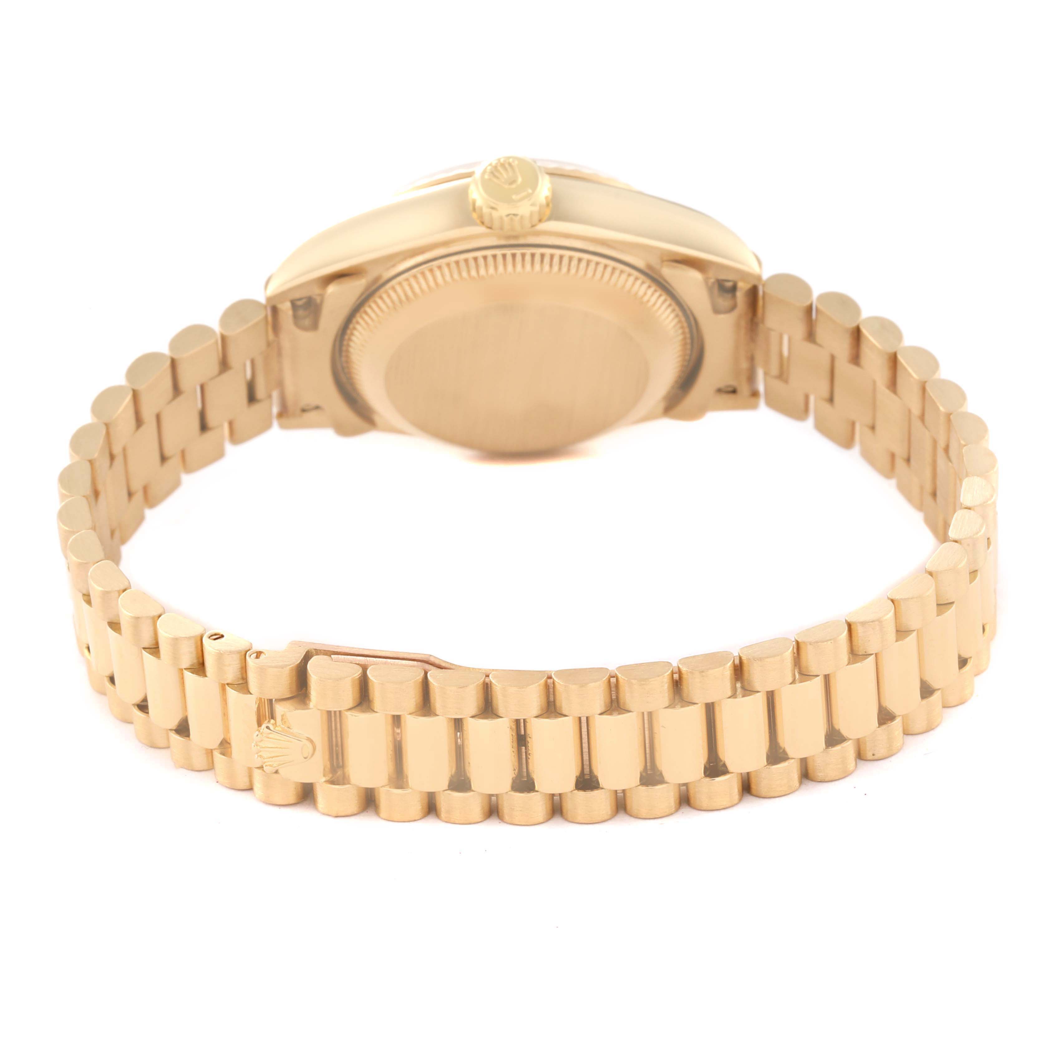 The image shows the back and bracelet of a Rolex President 69178 Women's Yellow Gold Champagne Dial 69178 Women's Yellow Gold Champagne Dial model watch in gold, viewed from a rear angle.
