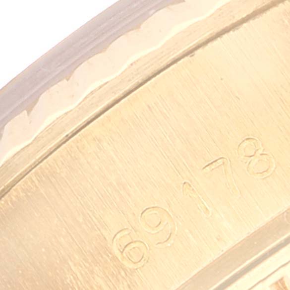 This image shows a close-up of the model number "69178" engraved on the case of a Rolex President 69178 Women's Yellow Gold Champagne Dial 69178 Women's Yellow Gold Champagne Dial watch.