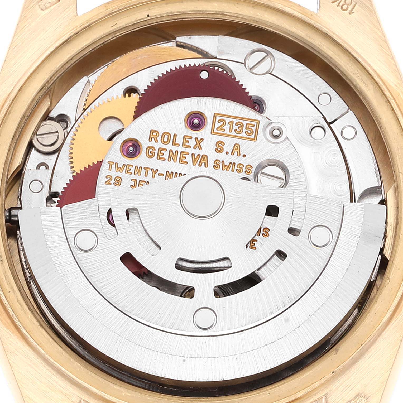 The image shows the internal mechanism of a Rolex President 69178 Women's Yellow Gold Champagne Dial 69178 Women's Yellow Gold Champagne Dial model watch, highlighting its intricate gears and movement parts.