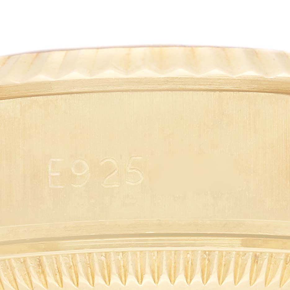 The image shows a close-up view of the Rolex President 69178 Women's Yellow Gold White Dial 69178 Women's Yellow Gold White Dial model, focusing on the case side with visible engravings and the edge of the bezel.