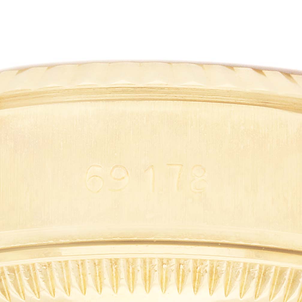 This image shows a close-up of the case back with model number engraving on a Rolex President 69178 Women's Yellow Gold White Dial 69178 Women's Yellow Gold White Dial watch.