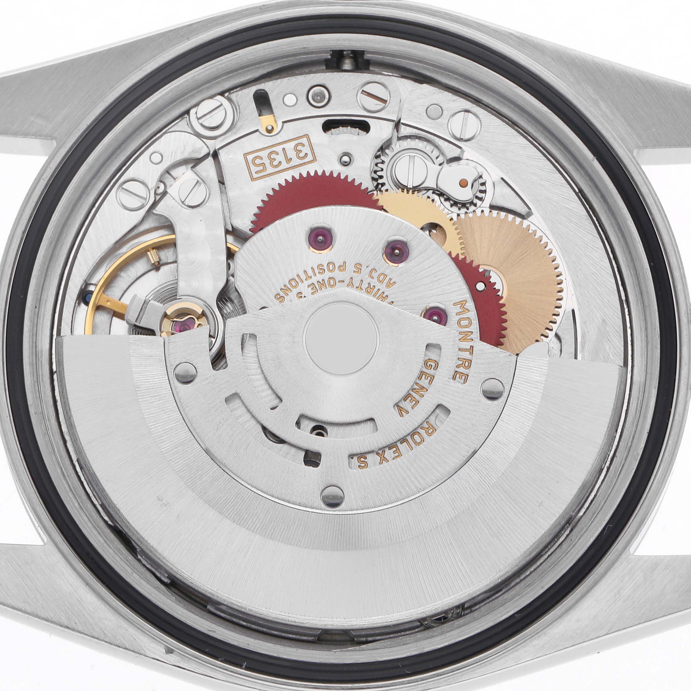 The image shows the movement from the back of a Rolex Datejust 16220 Men
s Stainless Steel Silver Dial 16220 Men
s Stainless Steel Silver Dial, revealing gears and rotor.