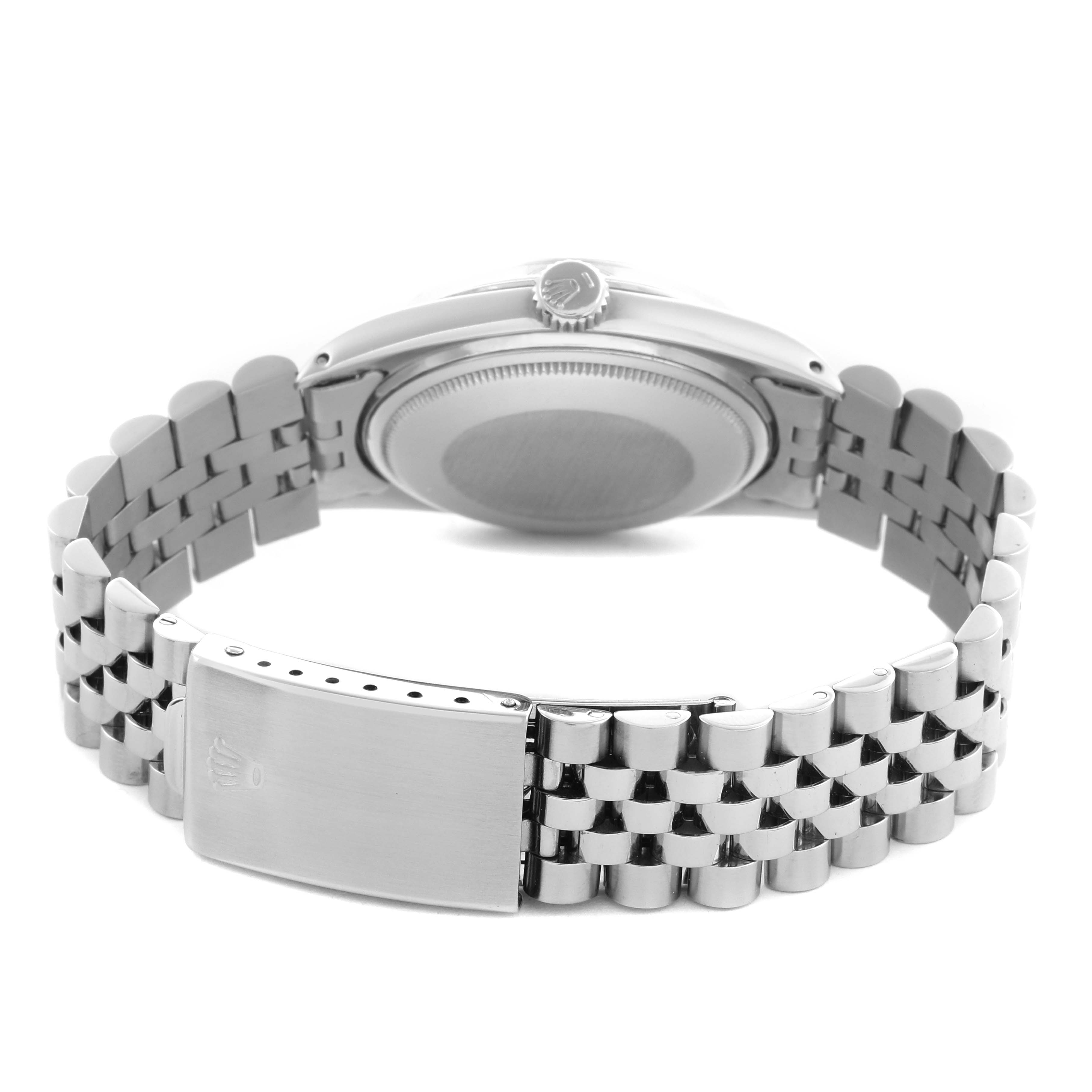 The Rolex Datejust 1600 Men
s Stainless Steel Silver Dial 1600 Men
s Stainless Steel Silver Dial watch is shown from the back, highlighting the clasp, bracelet, and case back.