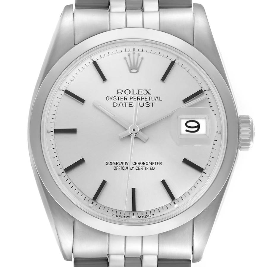 The Rolex Datejust watch is shown from the front, highlighting the dial, date window, and crown.