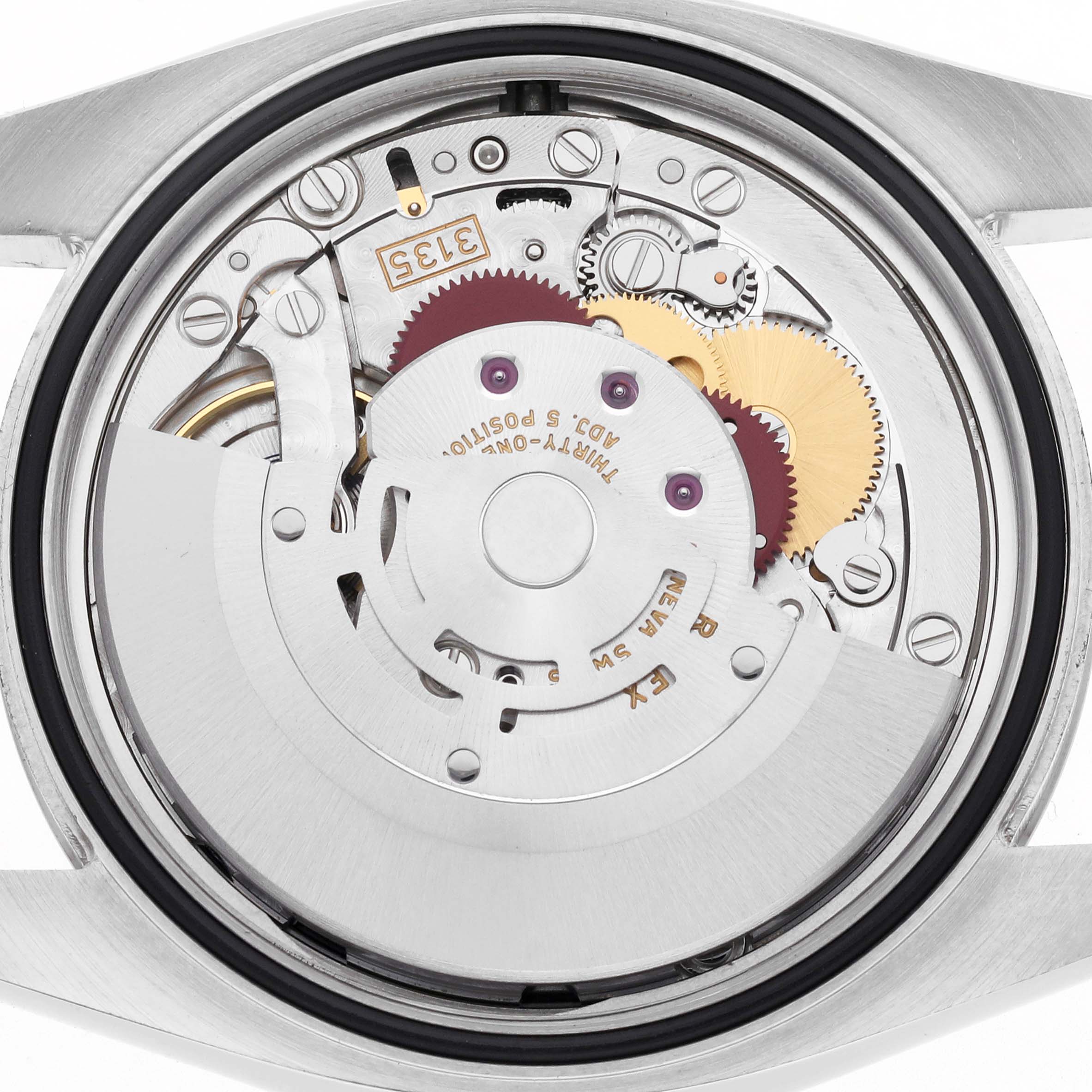 The image shows the internal movement of a Rolex Datejust 116234 Men's Stainless Steel Black Dial 116234 Men's Stainless Steel Black Dial watch from a top-down angle, highlighting gears and mechanical components.