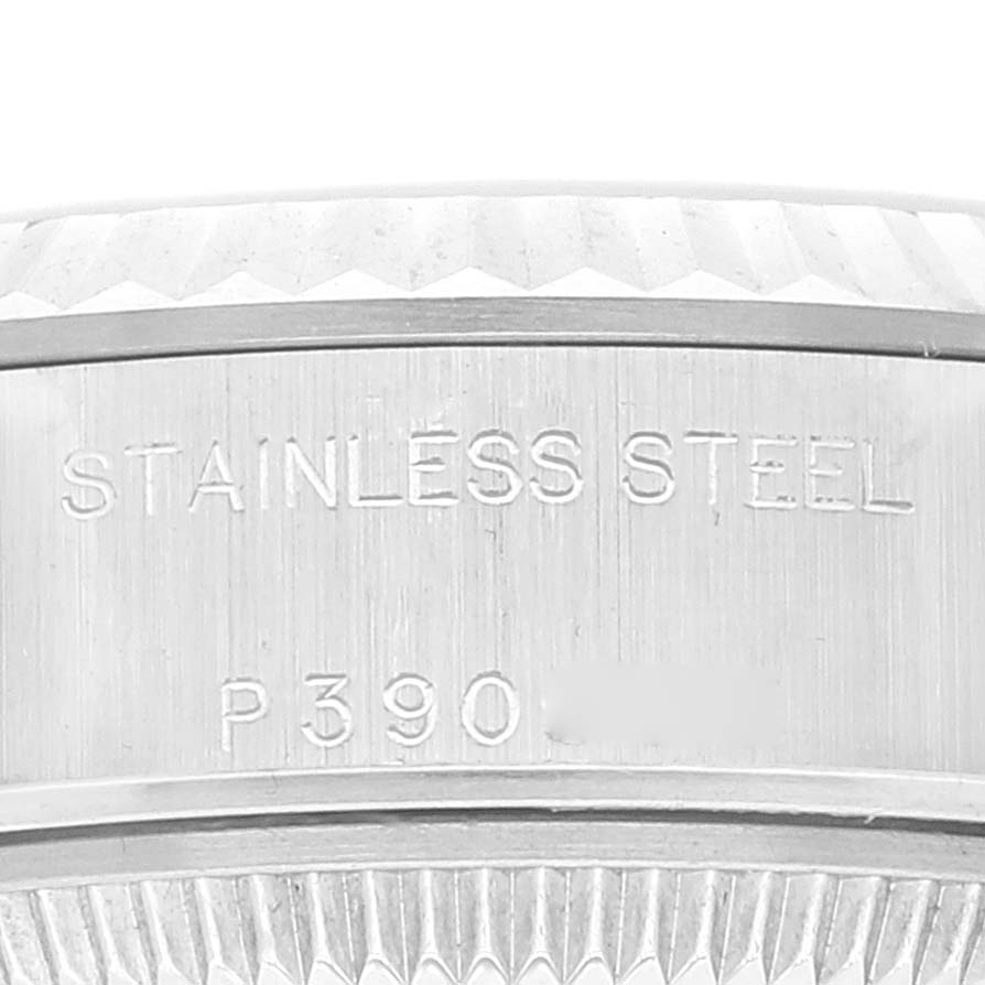 This image shows a close-up of the stainless steel case back of a Rolex Datejust 79174 Women's Stainless Steel Pink Dial 79174 Women's Stainless Steel Pink Dial watch.