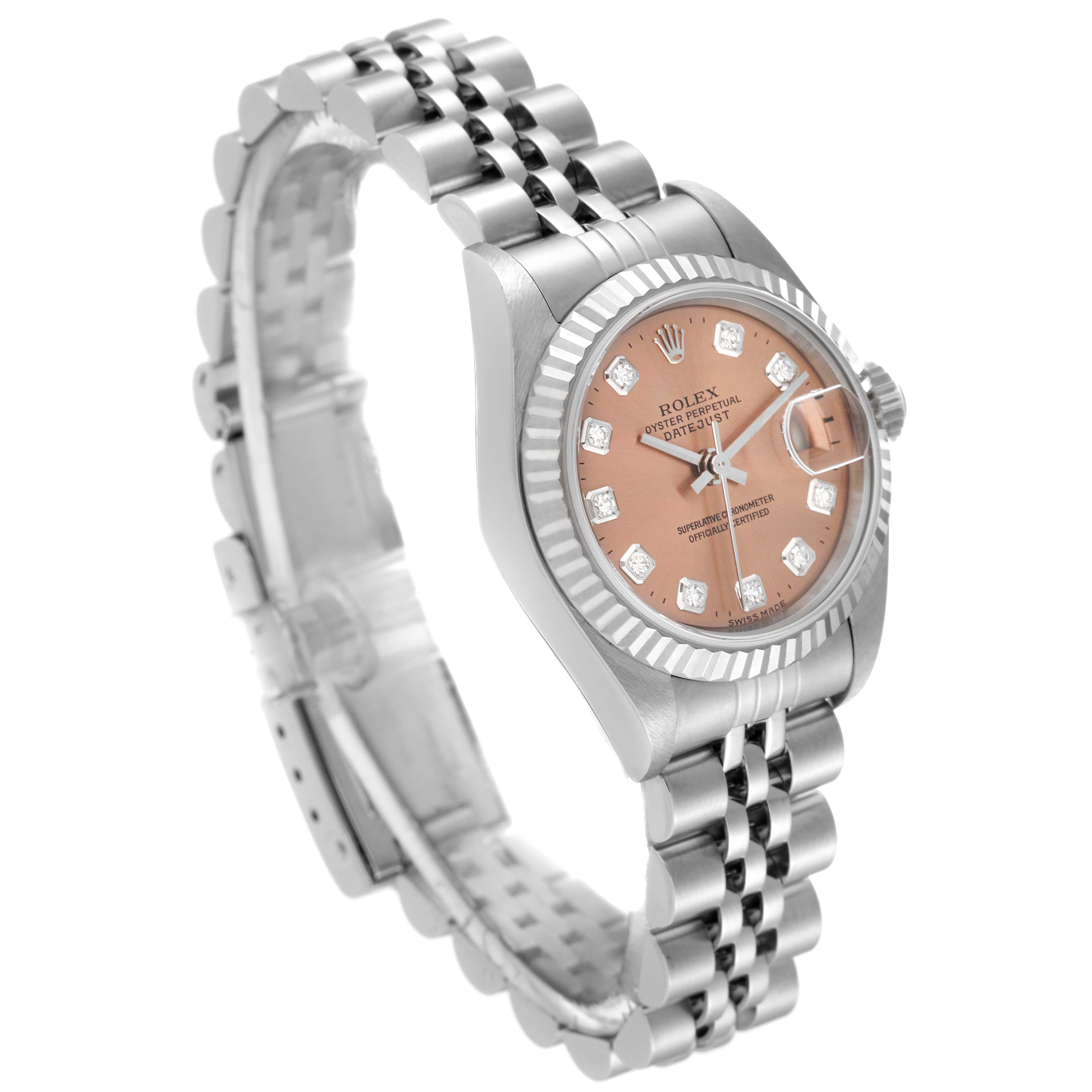 The image shows a side angle of a Rolex Datejust 79174 Women's Stainless Steel Pink Dial 79174 Women's Stainless Steel Pink Dial watch featuring a pink dial, diamond hour markers, and a stainless steel Jubilee bracelet.
