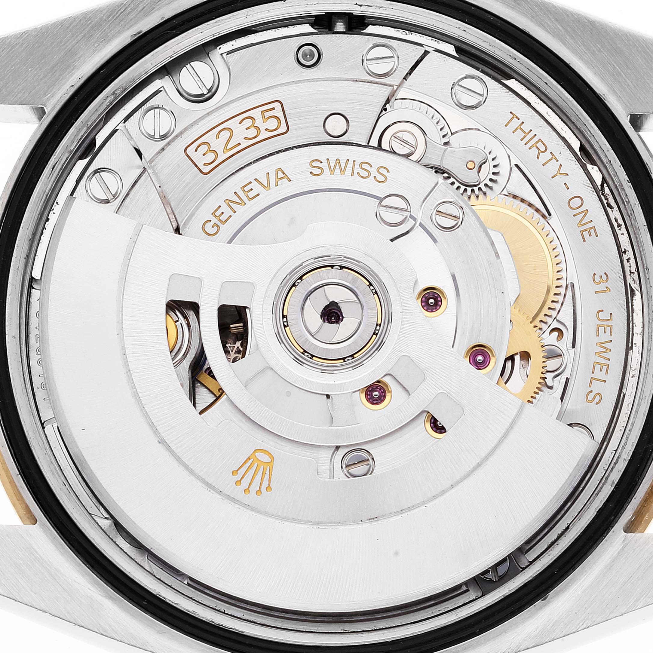 This image shows the movement and inner mechanism of a Rolex Datejust 126233 Men's Steel and Gold (two tone) Black Dial 126233 Men's Steel and Gold (two tone) Black Dial watch, specifically the caliber 3235.