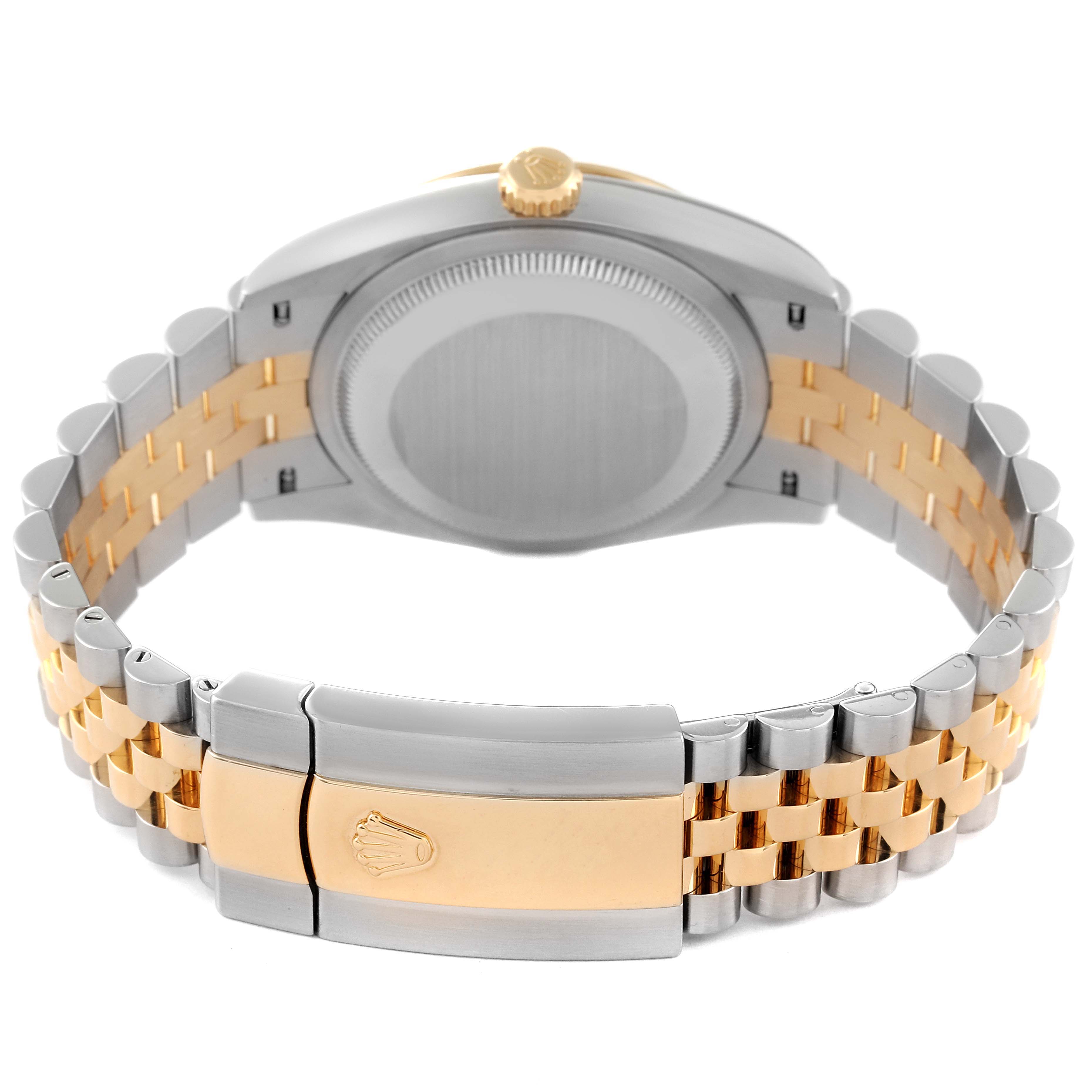 The image shows the back of a Rolex Datejust 126233 Men's Steel and Gold (two tone) Black Dial 126233 Men's Steel and Gold (two tone) Black Dial watch, featuring its two-tone bracelet and clasp with the brand's logo.