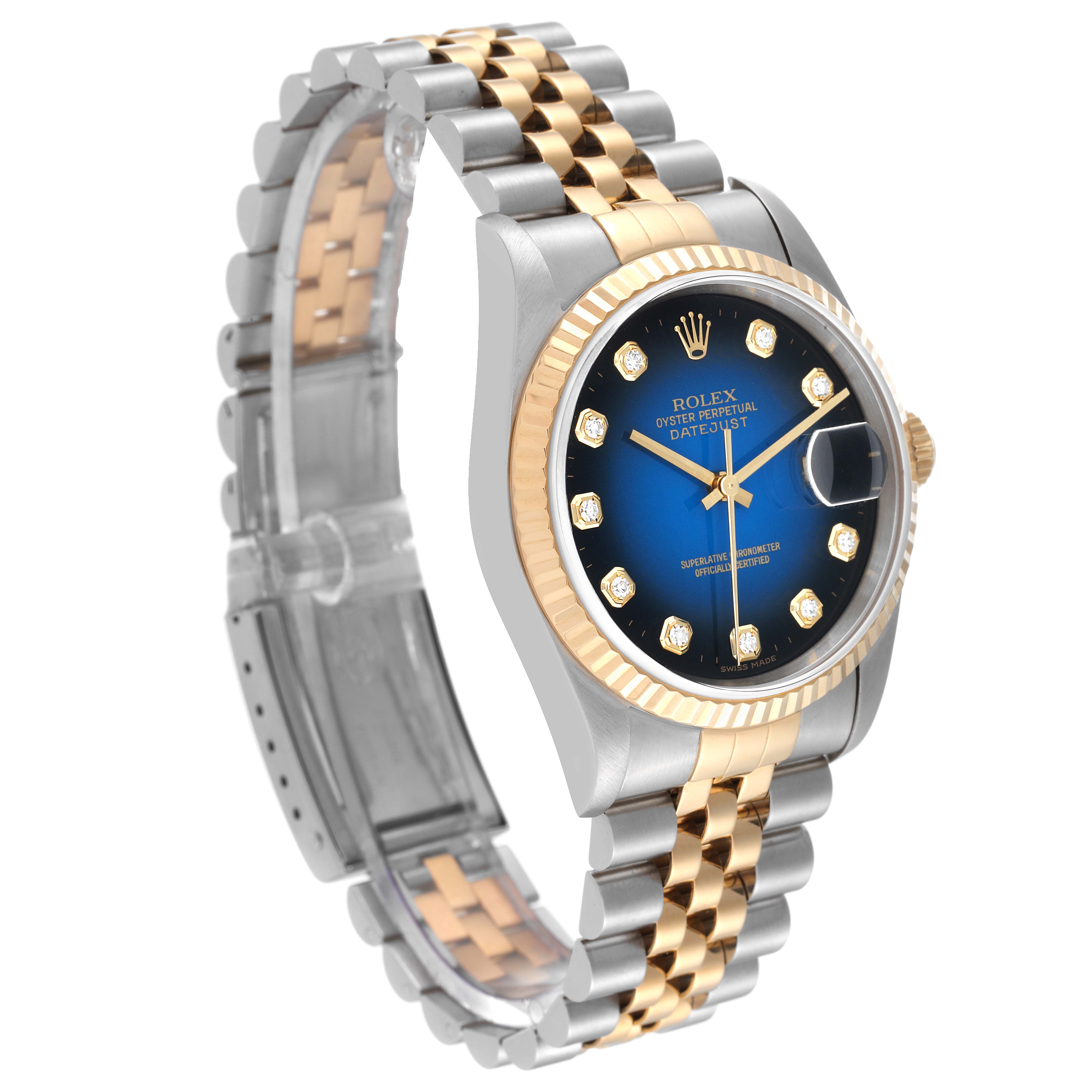 The Rolex Datejust 16233 Men's Steel and Gold (two tone) Blue Dial 16233 Men's Steel and Gold (two tone) Blue Dial watch is shown at an angle highlighting the face, fluted bezel, and two-tone jubilee bracelet.