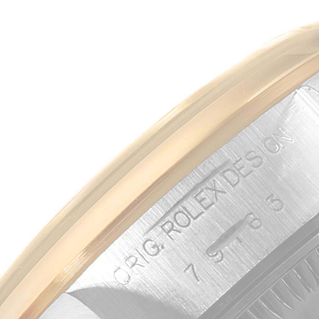 The image shows a close-up of the case side of a Rolex Datejust 79163 Women's Steel and Gold (two tone) Champagne Dial 79163 Women's Steel and Gold (two tone) Champagne Dial watch, highlighting the "ORIG. ROLEX DESIGN" engraving.