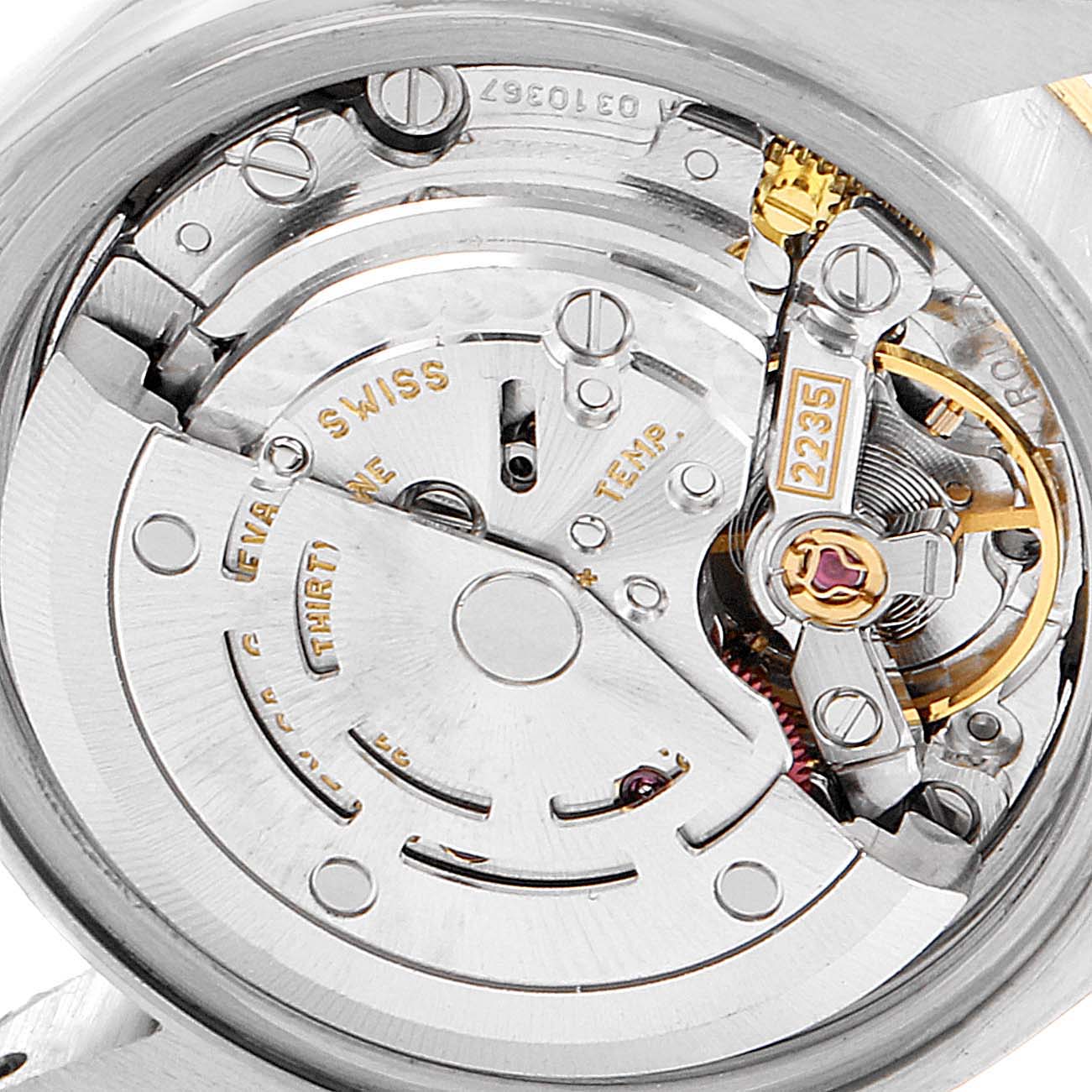 This image shows a close-up of the movement component of a Rolex Datejust 79163 Women's Steel and Gold (two tone) Champagne Dial 79163 Women's Steel and Gold (two tone) Champagne Dial watch, displaying its intricate inner mechanisms.