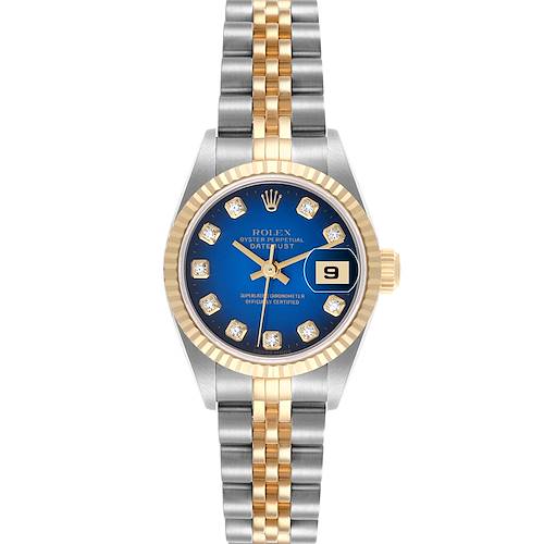 The Rolex Datejust is shown from a top-down angle, highlighting the blue dial, diamond hour markers, and two-tone bracelet.