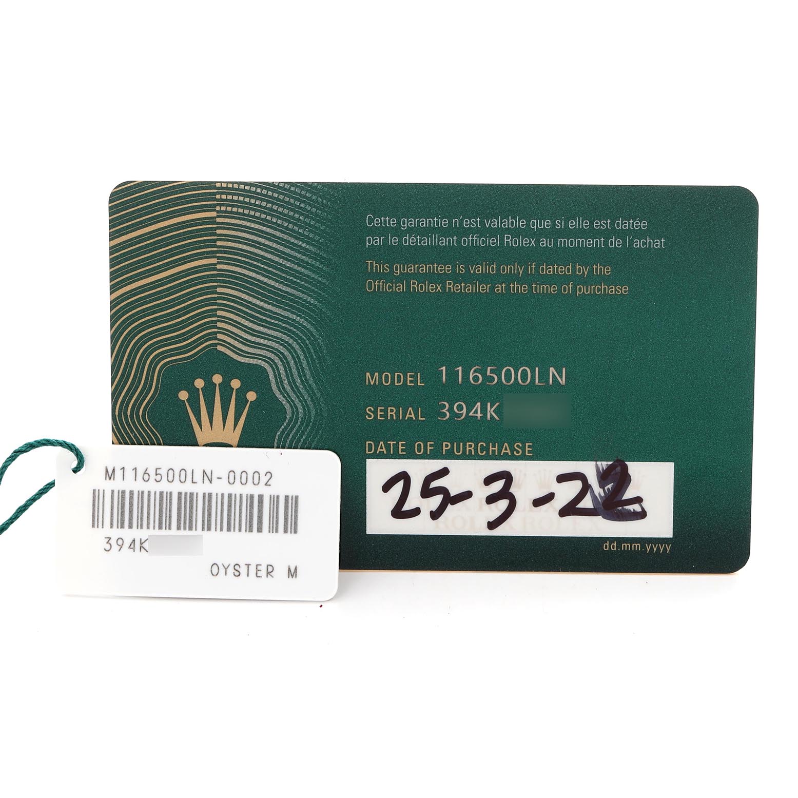 The image shows a Rolex Daytona 116500 Men's Stainless Steel Black Dial 116500 Men's Stainless Steel Black Dial model warranty card and a hang tag with the model number and purchase date.