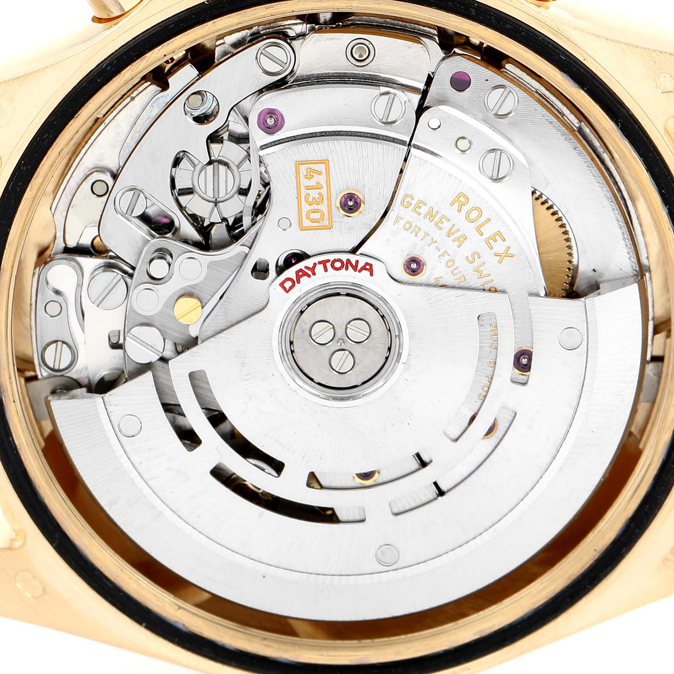 The image shows the movement mechanism of a Rolex Daytona 116528 Men's Yellow Gold White Dial 116528 Men's Yellow Gold White Dial watch from an overhead angle.