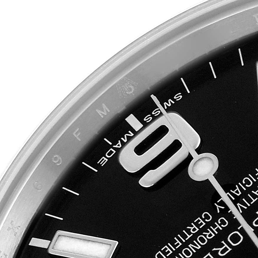 The image shows a close-up of the dial, including the "9" and the "Swiss Made" text on a Rolex Explorer 214270 Men's Stainless Steel Black Dial 214270 Men's Stainless Steel Black Dial watch.