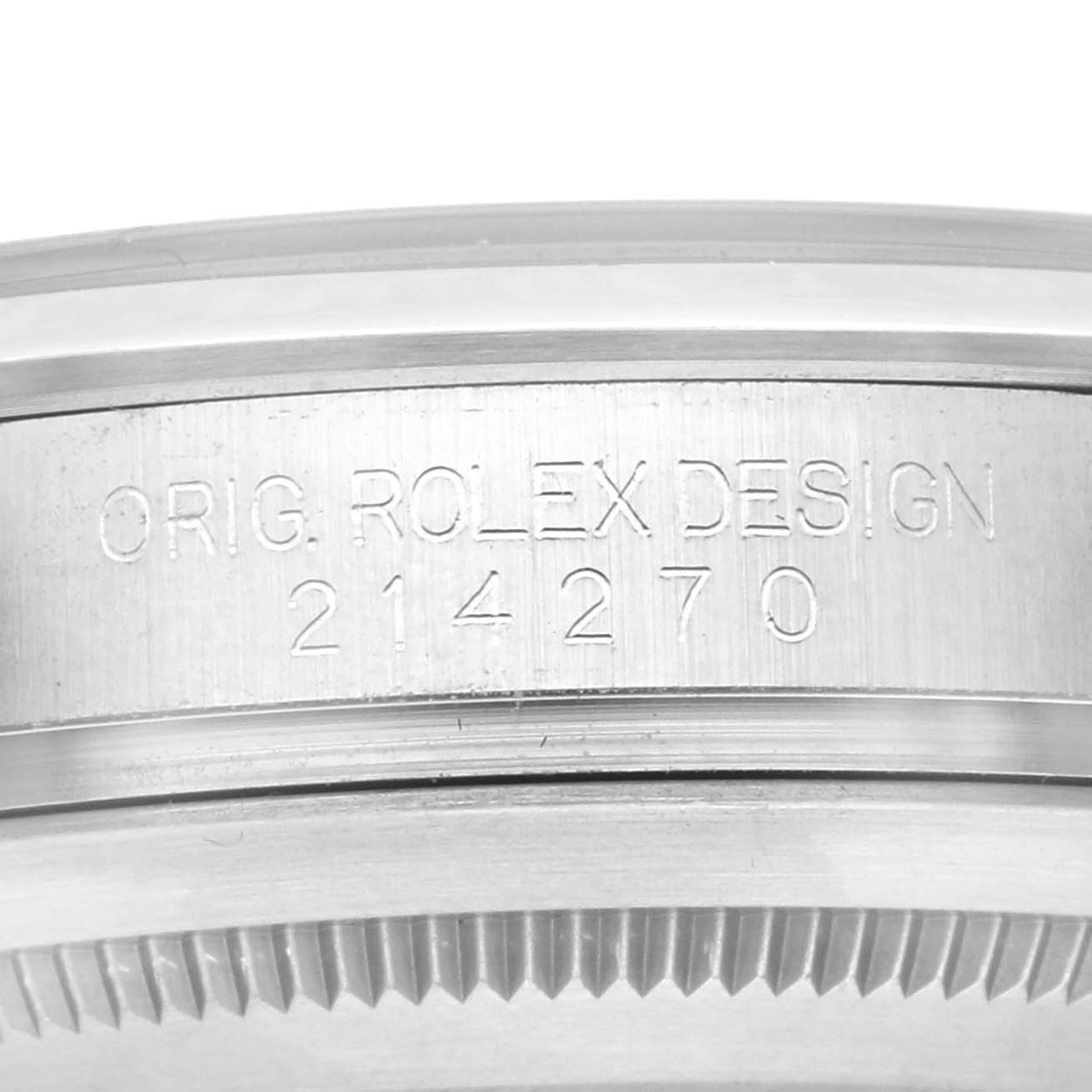 The image shows the side view of a Rolex Explorer 214270 Men's Stainless Steel Black Dial 214270 Men's Stainless Steel Black Dial watch case, focusing on the engraved model number and design text.