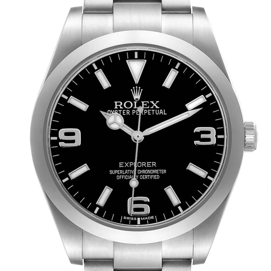 The image shows a Rolex Explorer watch from a front angle, displaying the dial, hands, crown, and part of the bracelet.