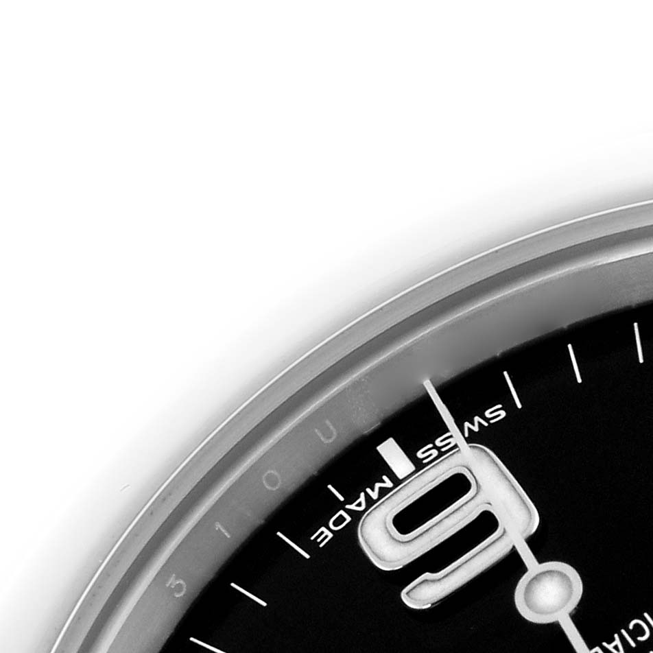 The image shows a close-up angle of the dial of a Rolex Explorer 214270 Men
s Stainless Steel Black Dial 214270 Men
s Stainless Steel Black Dial, highlighting the number 9 and "Swiss Made" text.