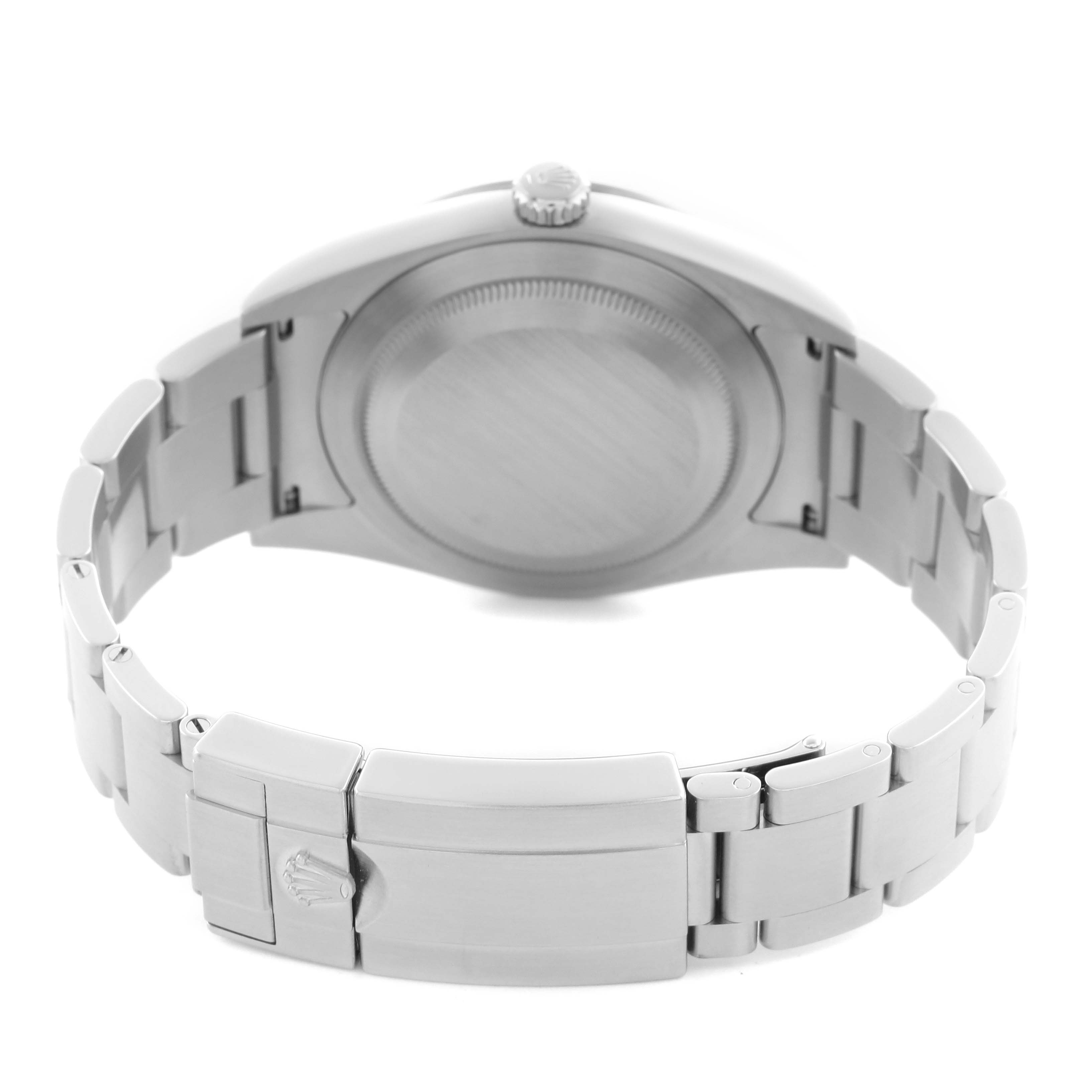 The image shows the back view of a Rolex Explorer 214270 Men
s Stainless Steel Black Dial 214270 Men
s Stainless Steel Black Dial watch, highlighting the case back, crown, and bracelet clasp with the Rolex logo.