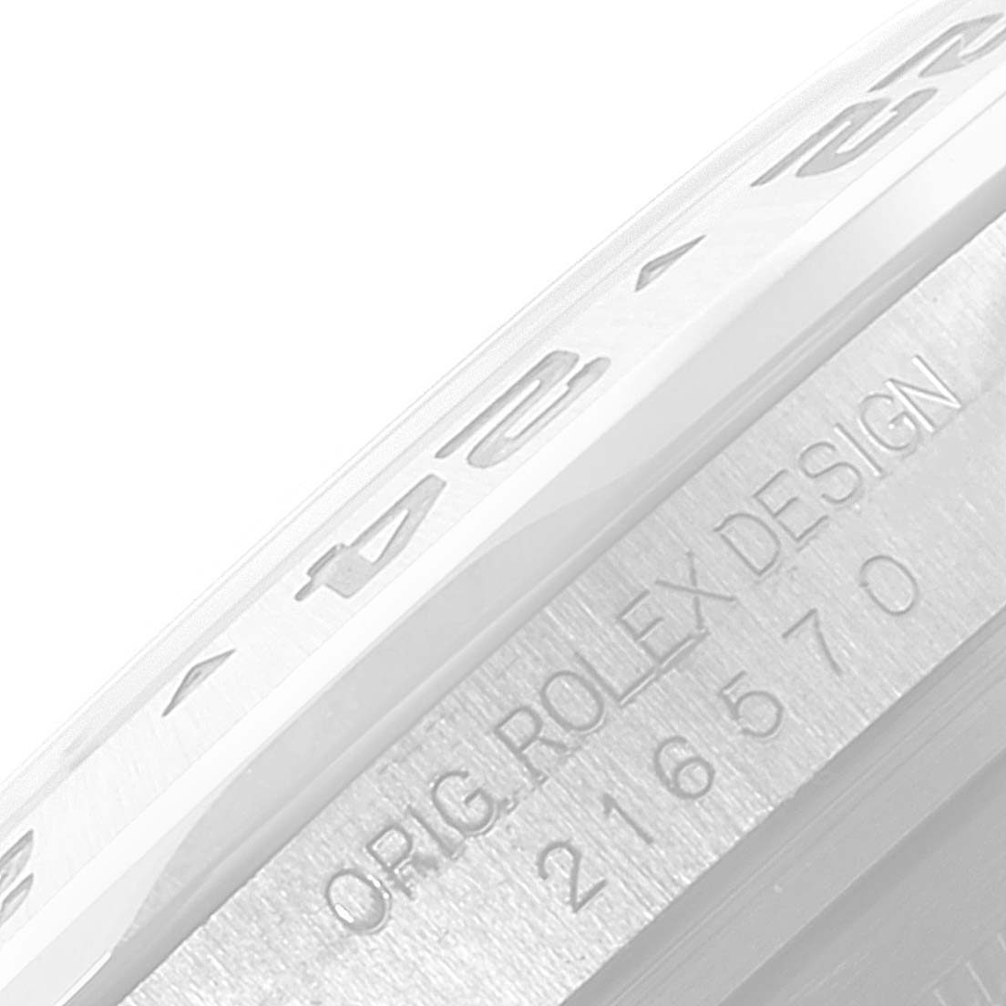 The image shows a close-up angle of the bezel and engraved side of a Rolex Explorer 216570 Men
s Stainless Steel Black Dial 216570 Men
s Stainless Steel Black Dial watch.