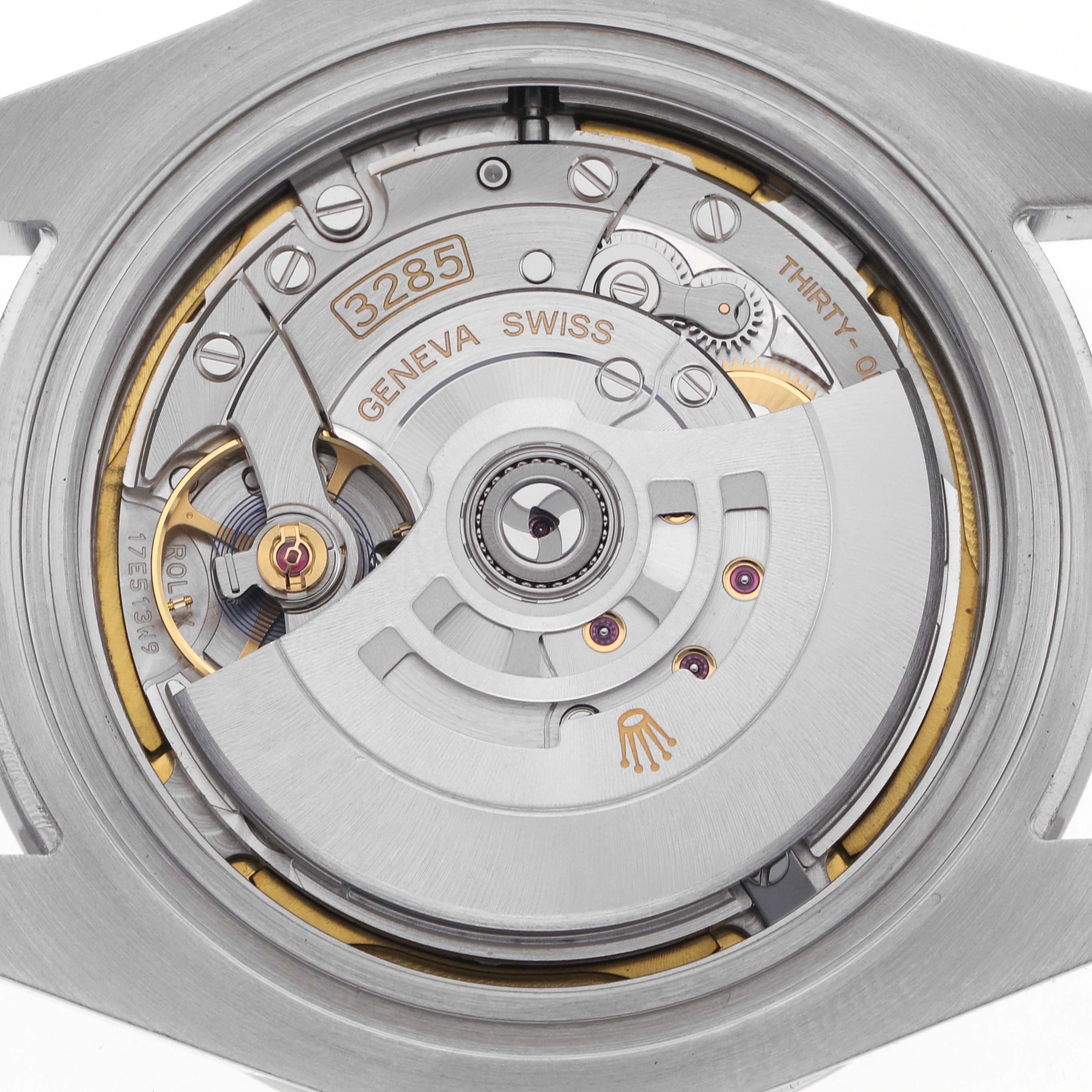 The image shows the back view of the Rolex GMT-Master 226570 Men's Stainless Steel Black Dial 226570 Men's Stainless Steel Black Dial watch, displaying its automatic movement and rotor.