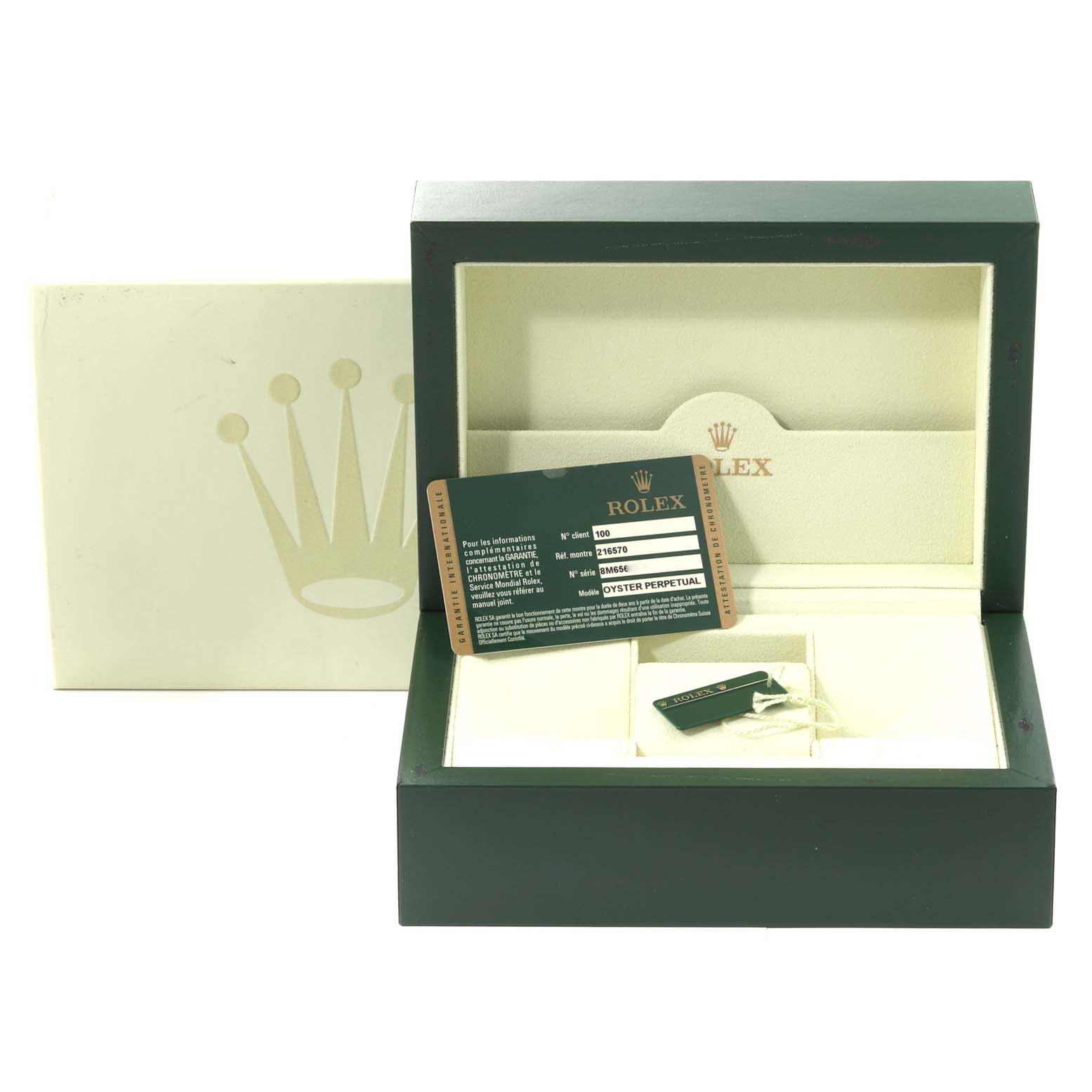 The image shows the inner and outer boxes, warranty card, and tags for a Rolex Explorer 216570 Men's Stainless Steel White Dial 216570 Men's Stainless Steel White Dial model.