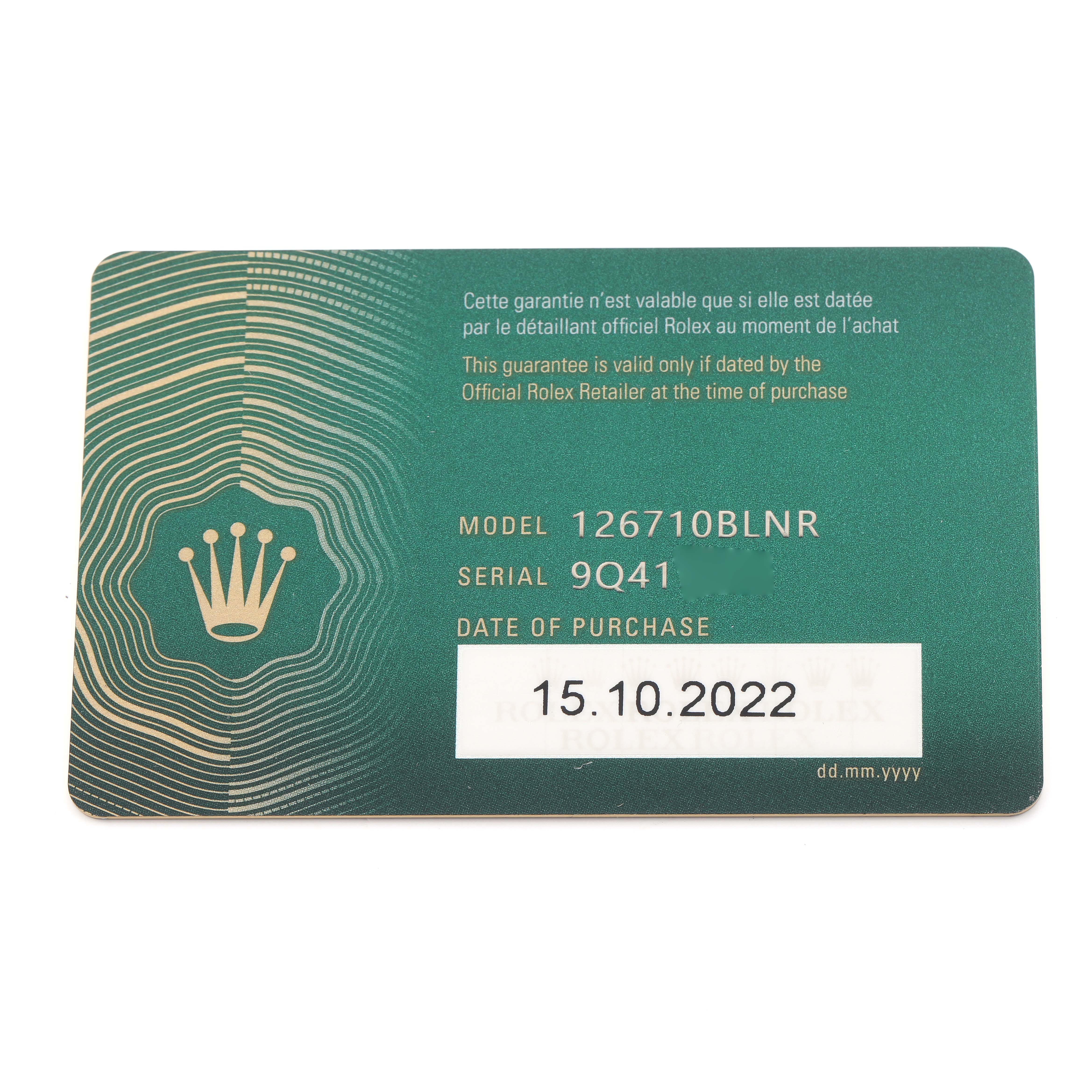 The image shows a warranty card for the Rolex GMT-Master 126710 Men's Stainless Steel Black Dial 126710 Men's Stainless Steel Black Dial model 126710BLNR, displaying purchase date and serial number.