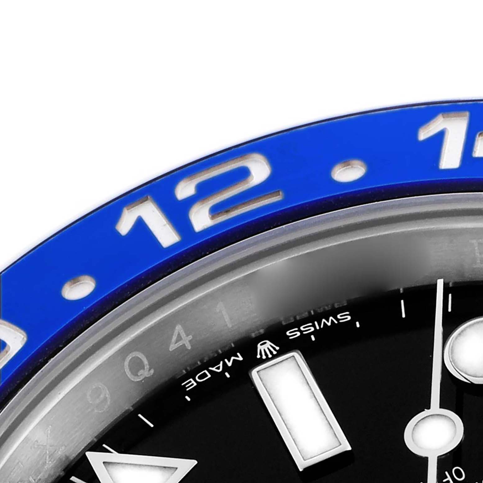The image shows a close-up of the bezel and part of the dial of a Rolex GMT-Master 126710 Men's Stainless Steel Black Dial 126710 Men's Stainless Steel Black Dial, highlighting the blue bezel and hour marker.