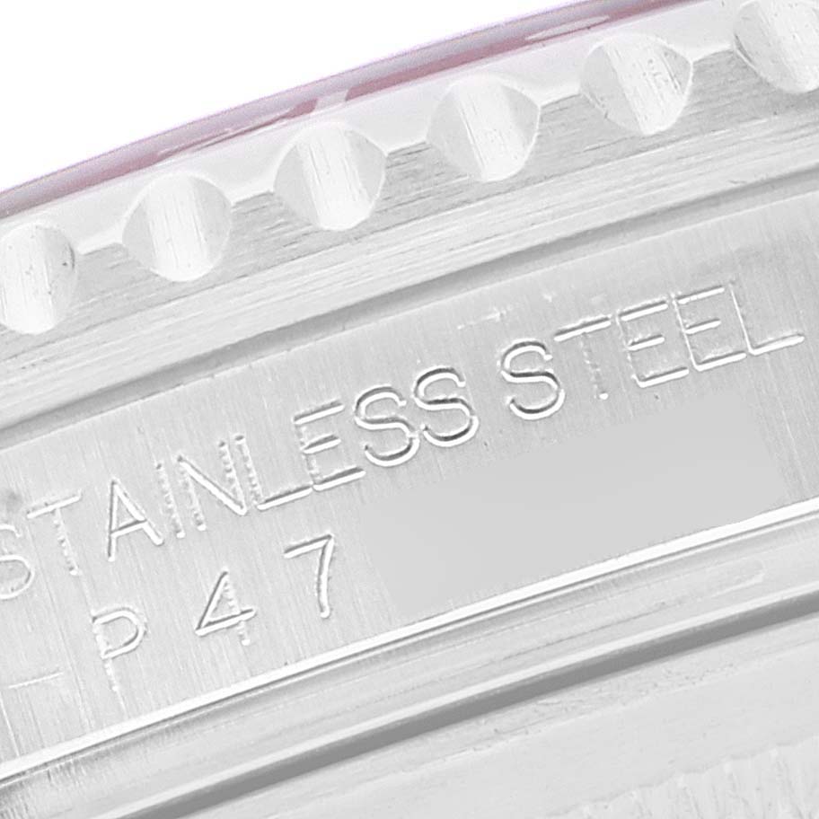 This close-up image of the Rolex GMT-Master 16710 Men
s Stainless Steel Black Dial 16710 Men
s Stainless Steel Black Dial watch shows part of the stainless steel case and the text "STAINLESS STEEL".