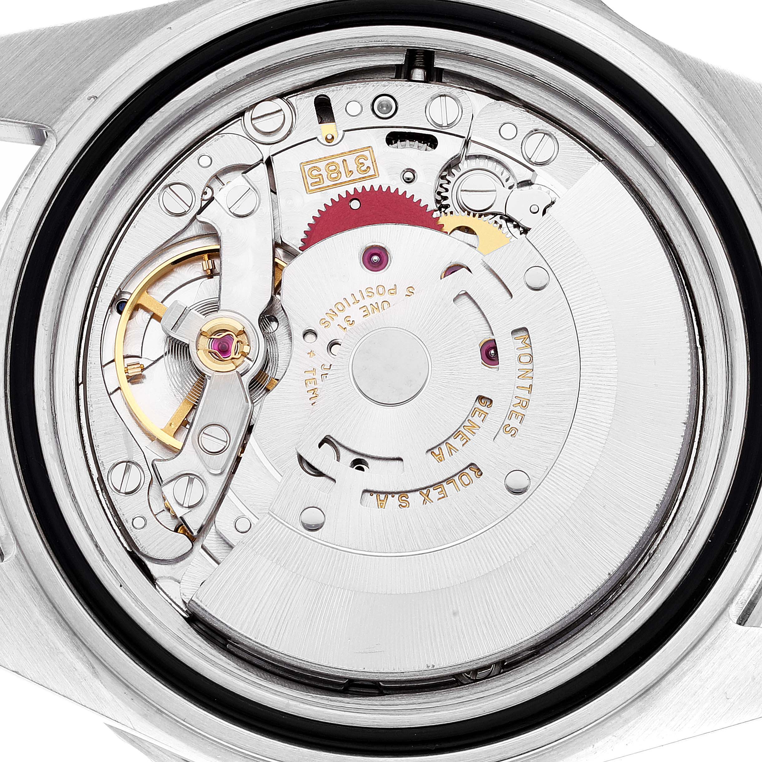 The image shows the internal mechanism of a Rolex GMT-Master 16710 Men
s Stainless Steel Black Dial 16710 Men
s Stainless Steel Black Dial watch, viewed from the back case with visible gears and components.