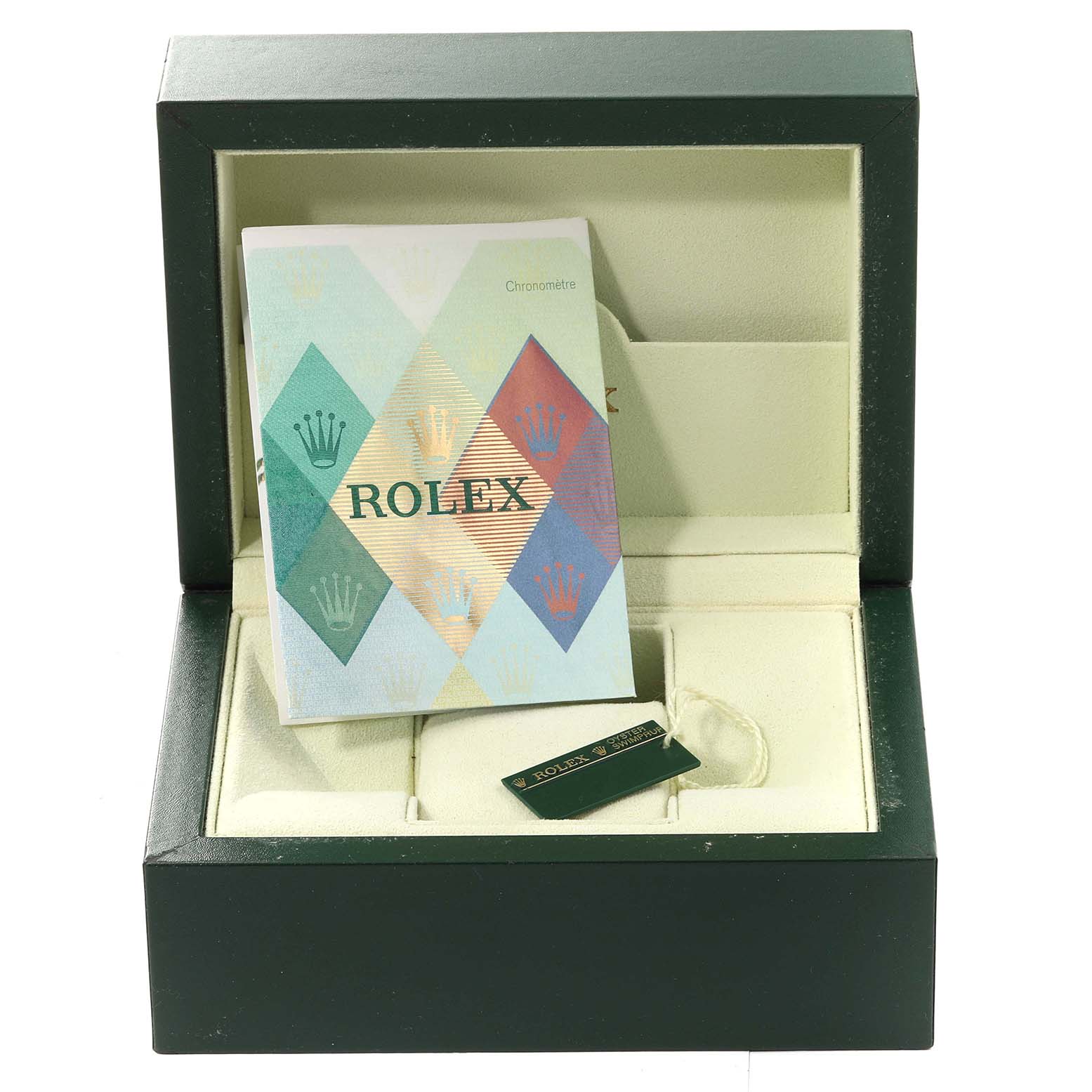 This image shows an open green Rolex box for the GMT-Master model containing a booklet and a tag.