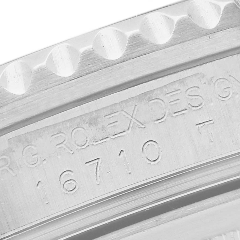 The image shows a close-up of the case back engraving on a Rolex GMT-Master 16710 Men
s Stainless Steel Black Dial 16710 Men
s Stainless Steel Black Dial model, specifically displaying the model number 16710.