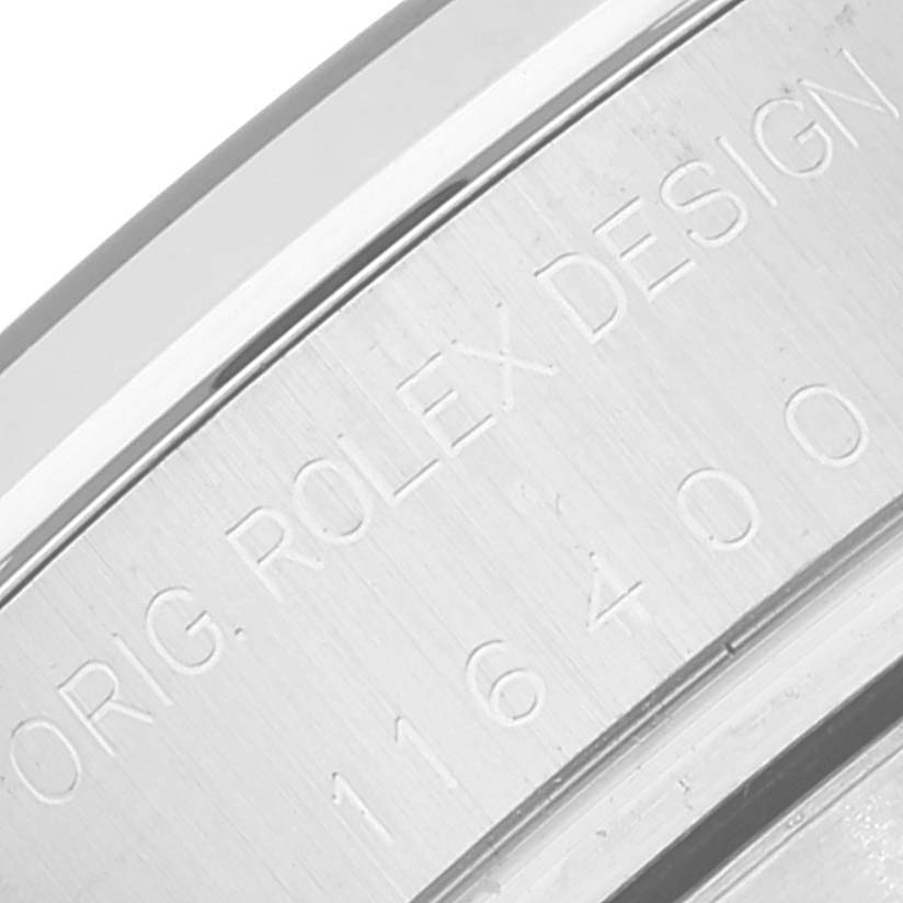 The image shows a close-up of the side engraving on the Rolex Milgauss 116400 Men
s Stainless Steel Blue Dial 116400 Men
s Stainless Steel Blue Dial model, featuring "ORG. ROLEX DESIGN 116400."