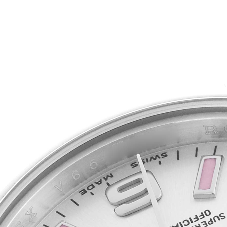 The image shows a close-up of the dial and bezel of the Rolex Oyster Perpetual 176200 Women's Stainless Steel Silver Dial 176200 Women's Stainless Steel Silver Dial, highlighting numbers and part of its minute markings.