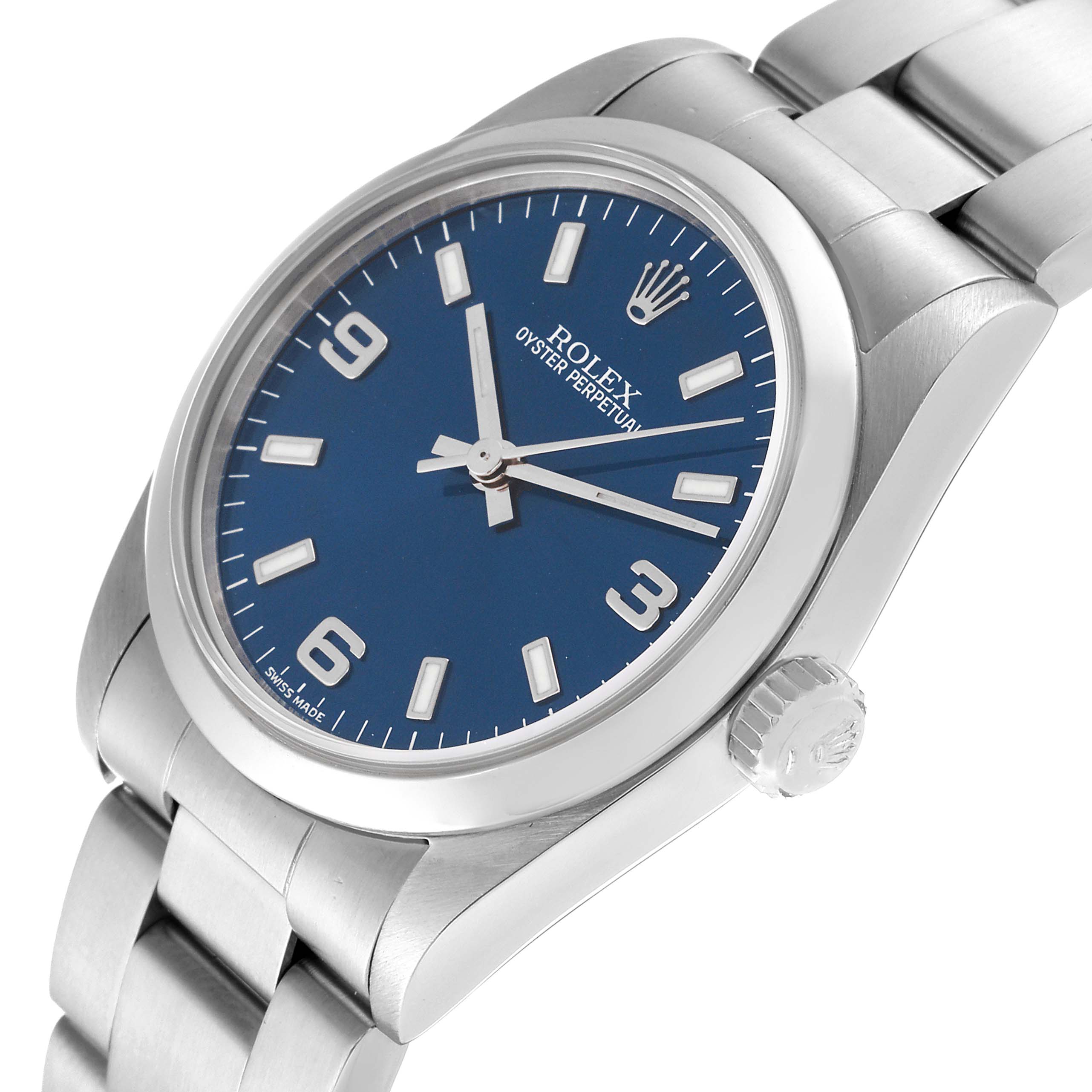 The image shows a Rolex Oyster Perpetual watch from an angled front view, highlighting the blue dial, stainless steel case, and bracelet.